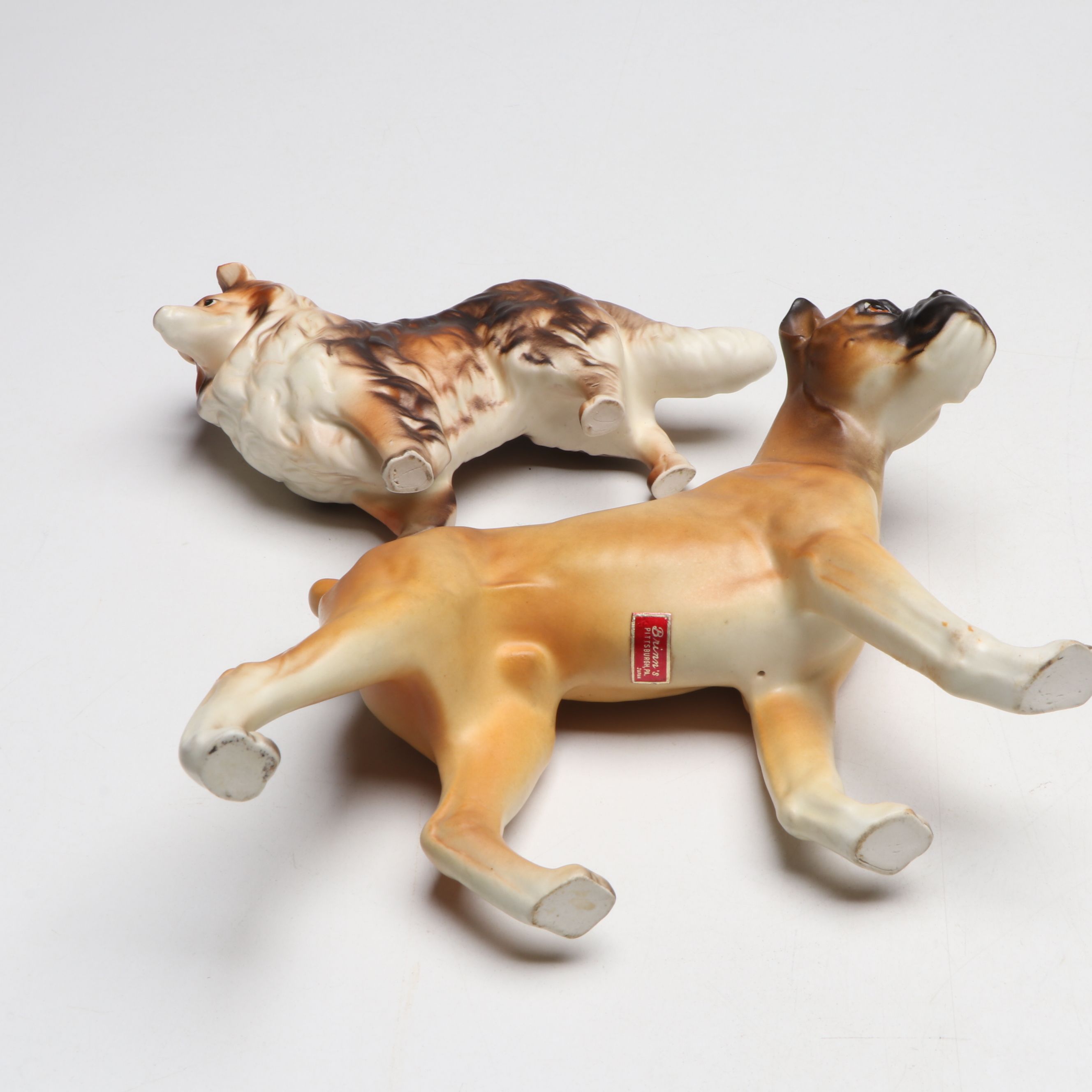 Brimm's and Other Porcelain Dogs with Carved Wooden Animals