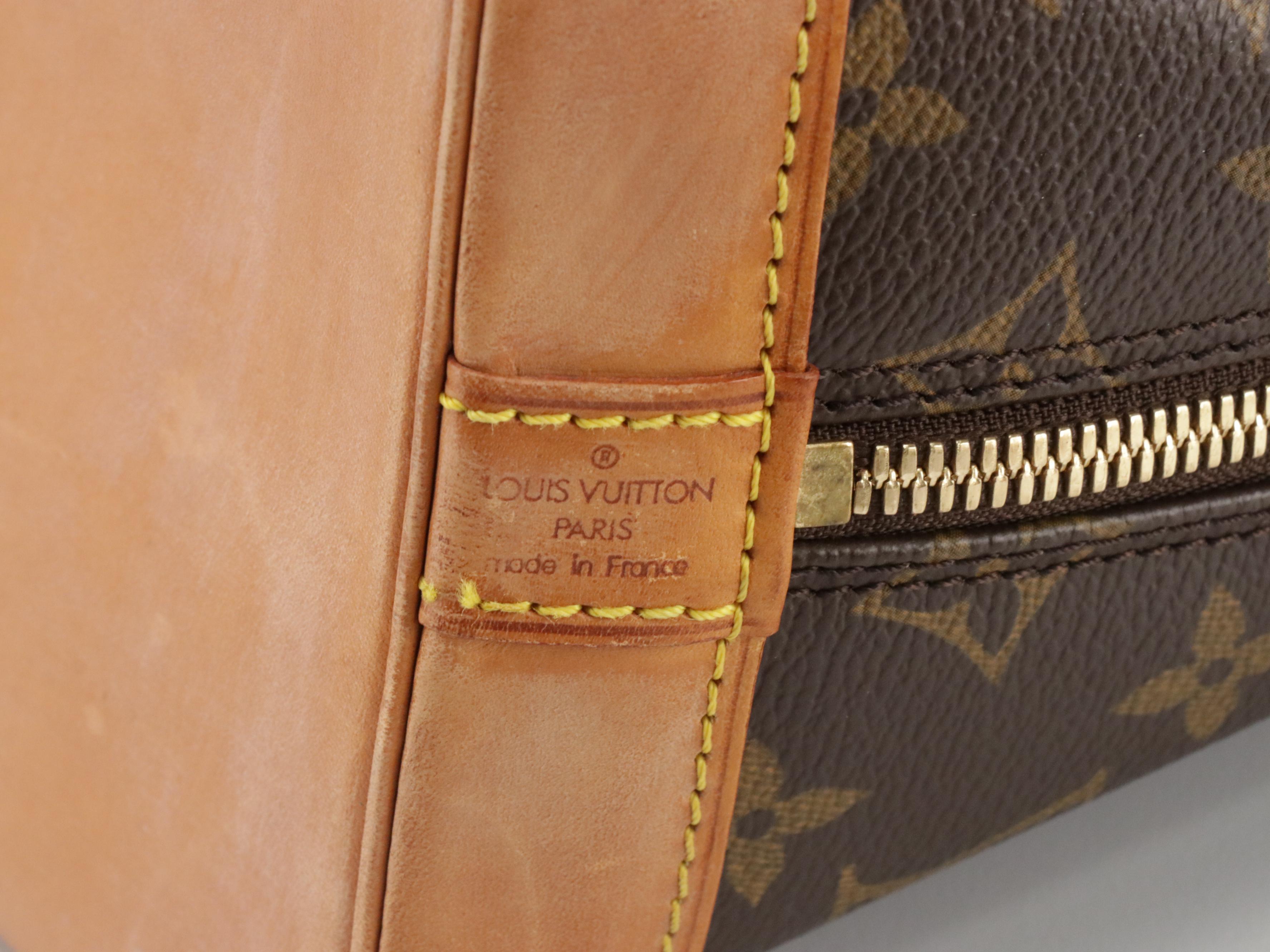 Louis Vuitton Alma PM Handbag in Monogram Canvas and Vachetta Leather