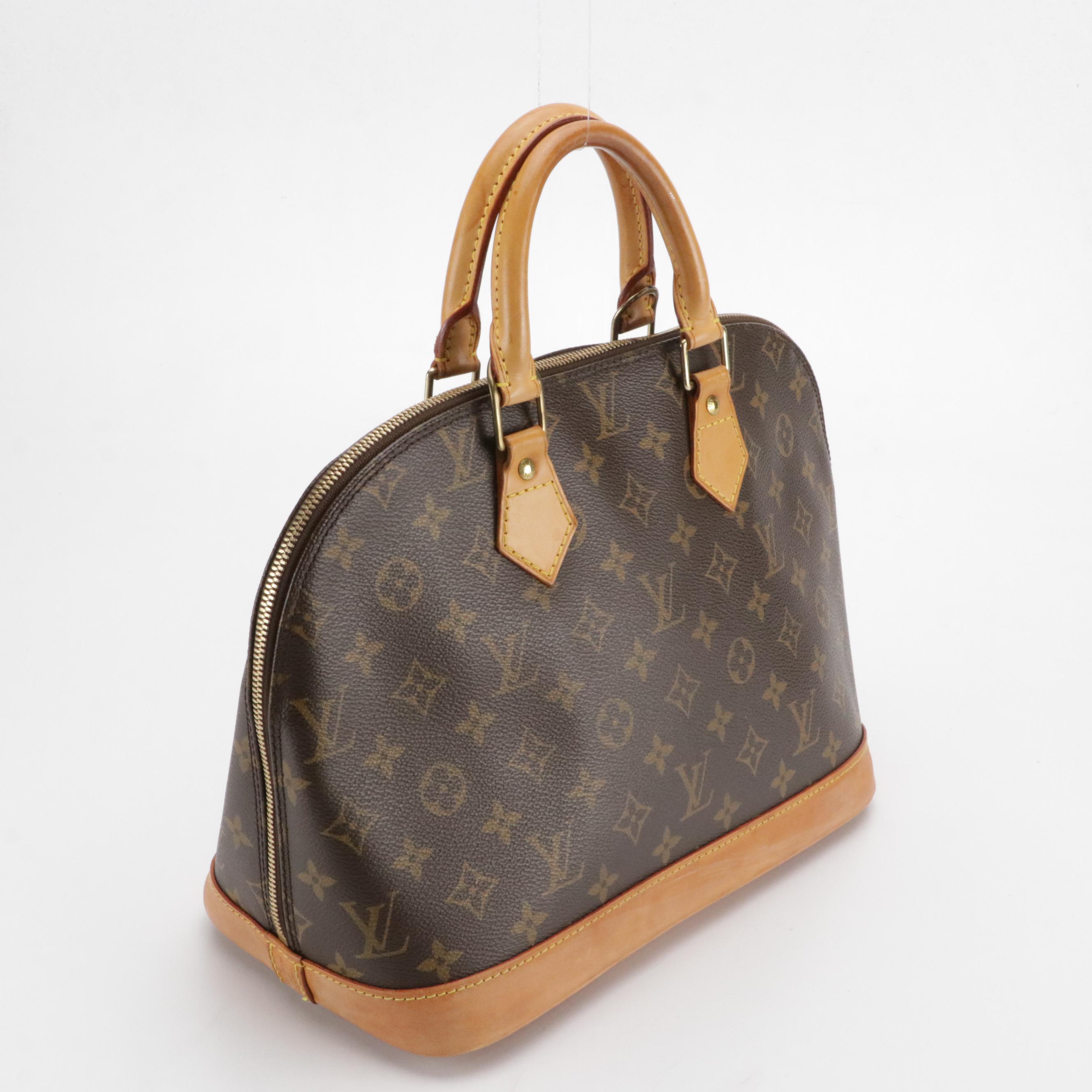 Louis Vuitton Alma PM Handbag in Monogram Canvas and Vachetta Leather