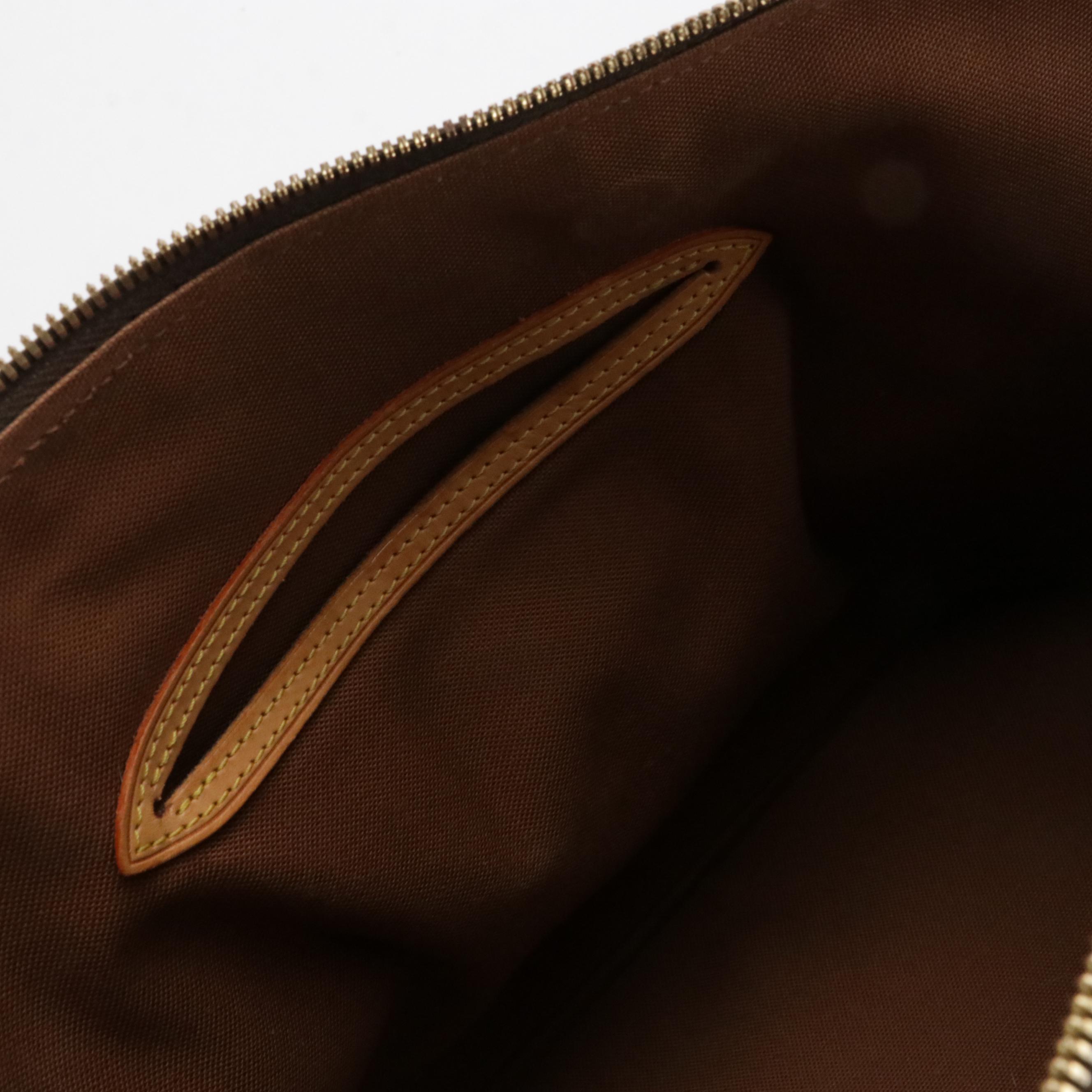 Louis Vuitton Alma PM Handbag in Monogram Canvas and Vachetta Leather