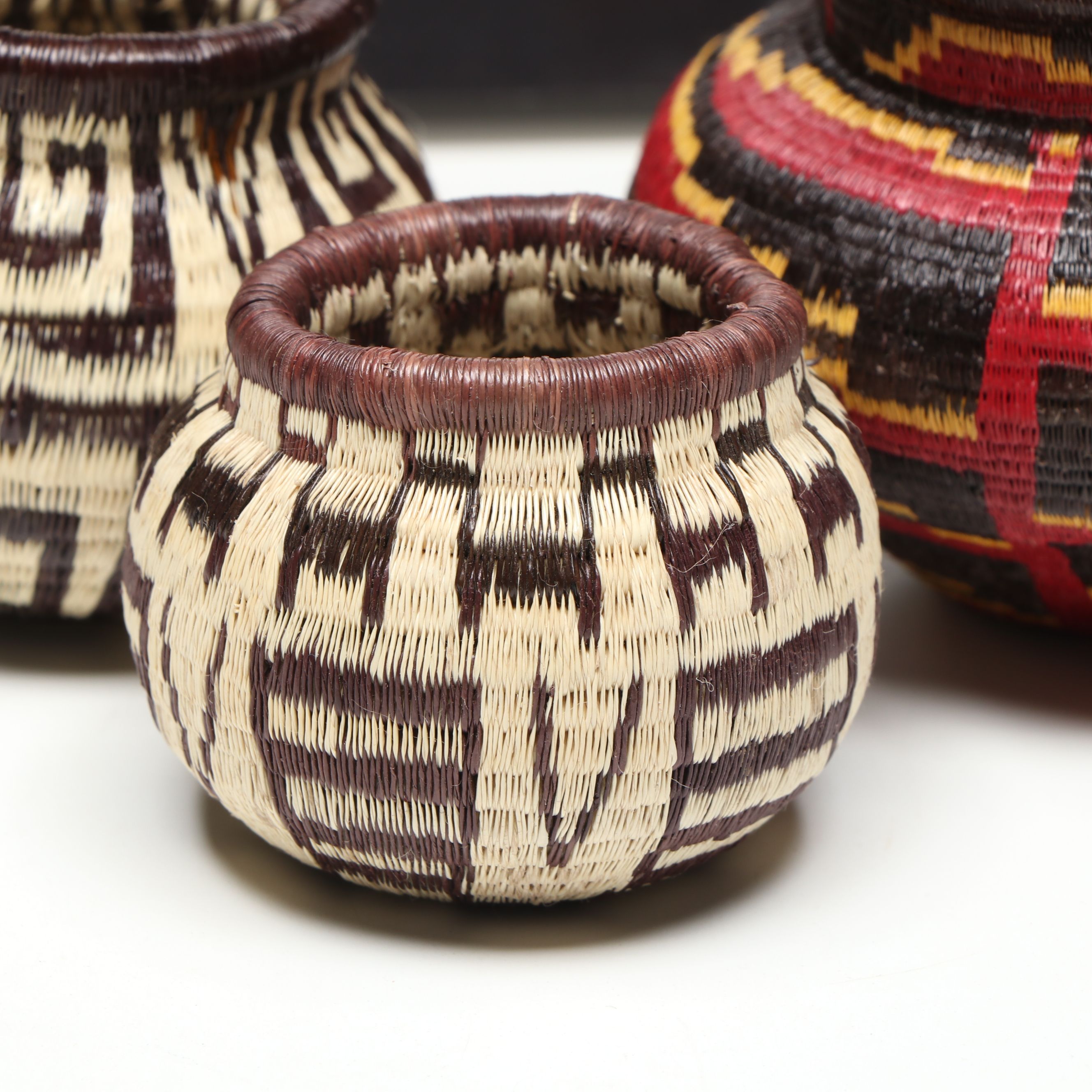 Panamanian Emberá-Wounaan Chunga Fiber with Butterfly Motif and Other Baskets