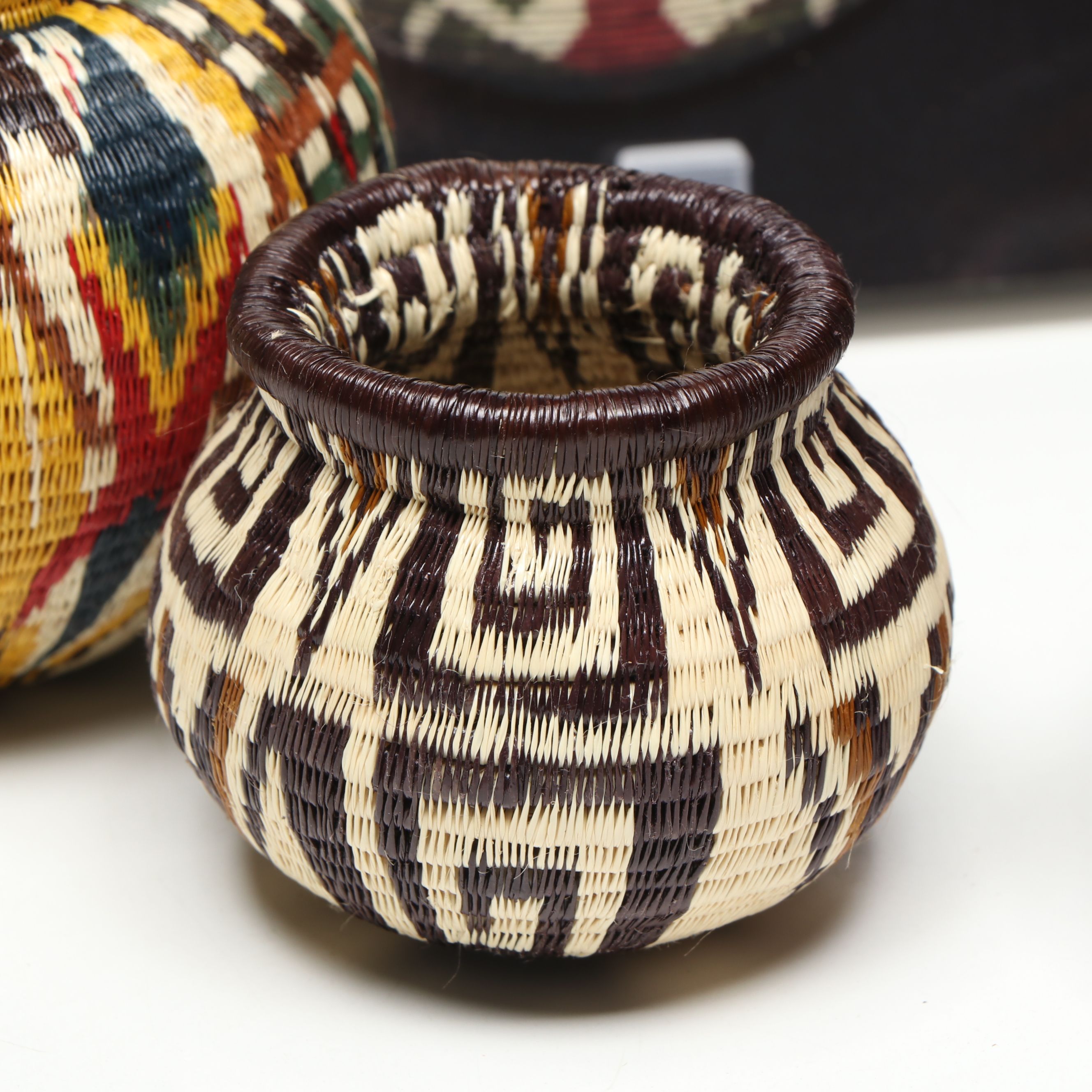 Panamanian Emberá-Wounaan Chunga Fiber with Butterfly Motif and Other Baskets