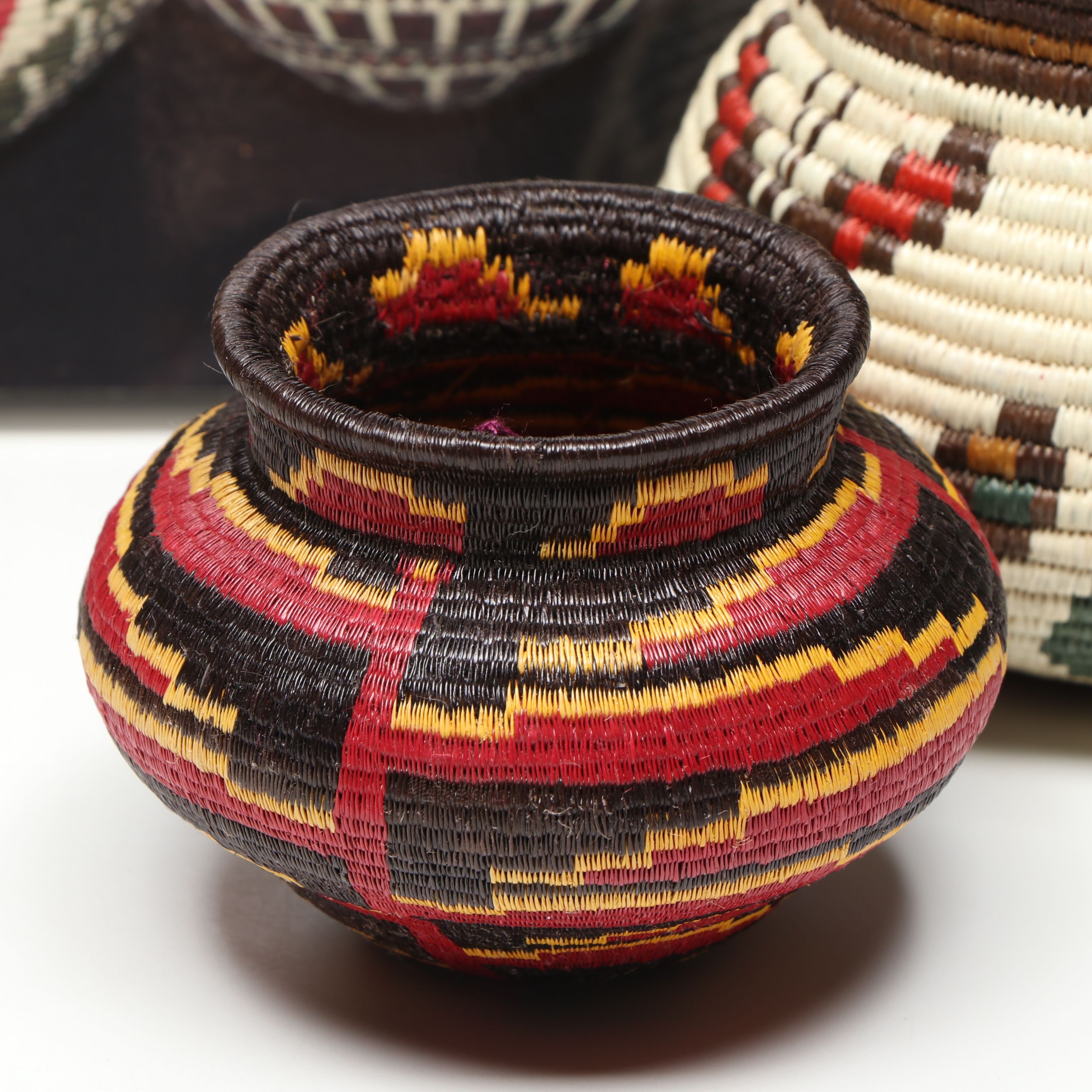 Panamanian Emberá-Wounaan Chunga Fiber with Butterfly Motif and Other Baskets