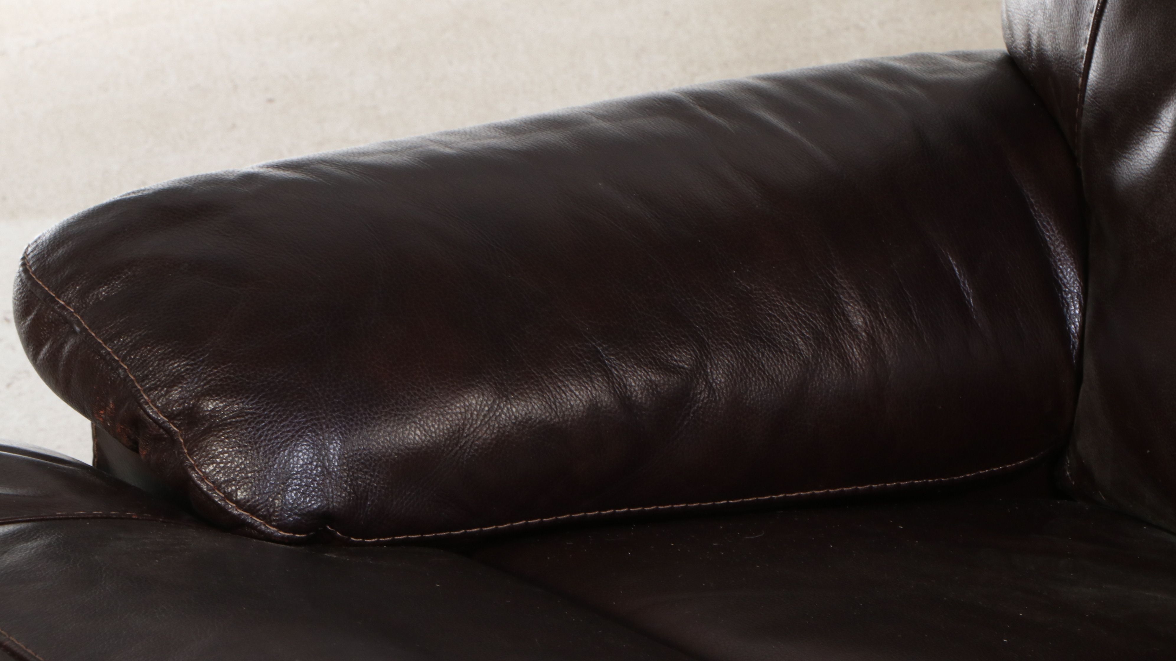 Contemporary Overstuffed Brown Bonded Leather Recliner Chair and Ottoman