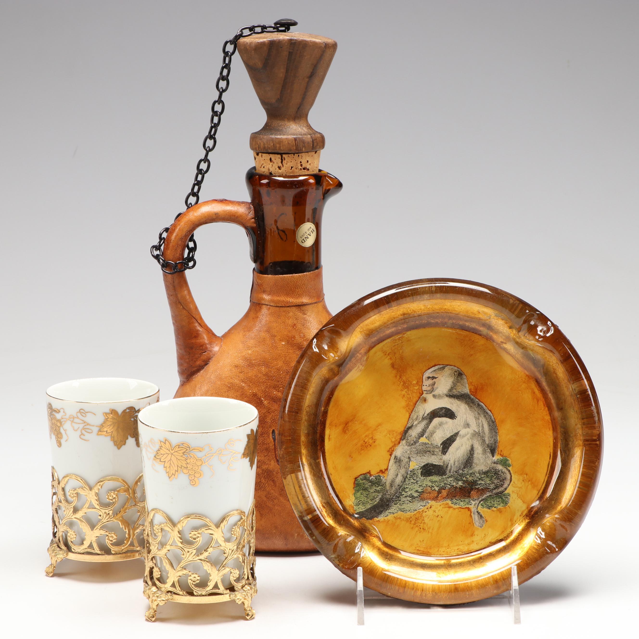 Spanish Vino Glass Decanter, Glass Gorilla Ashtray, and J. Emrich Porcelain Cups