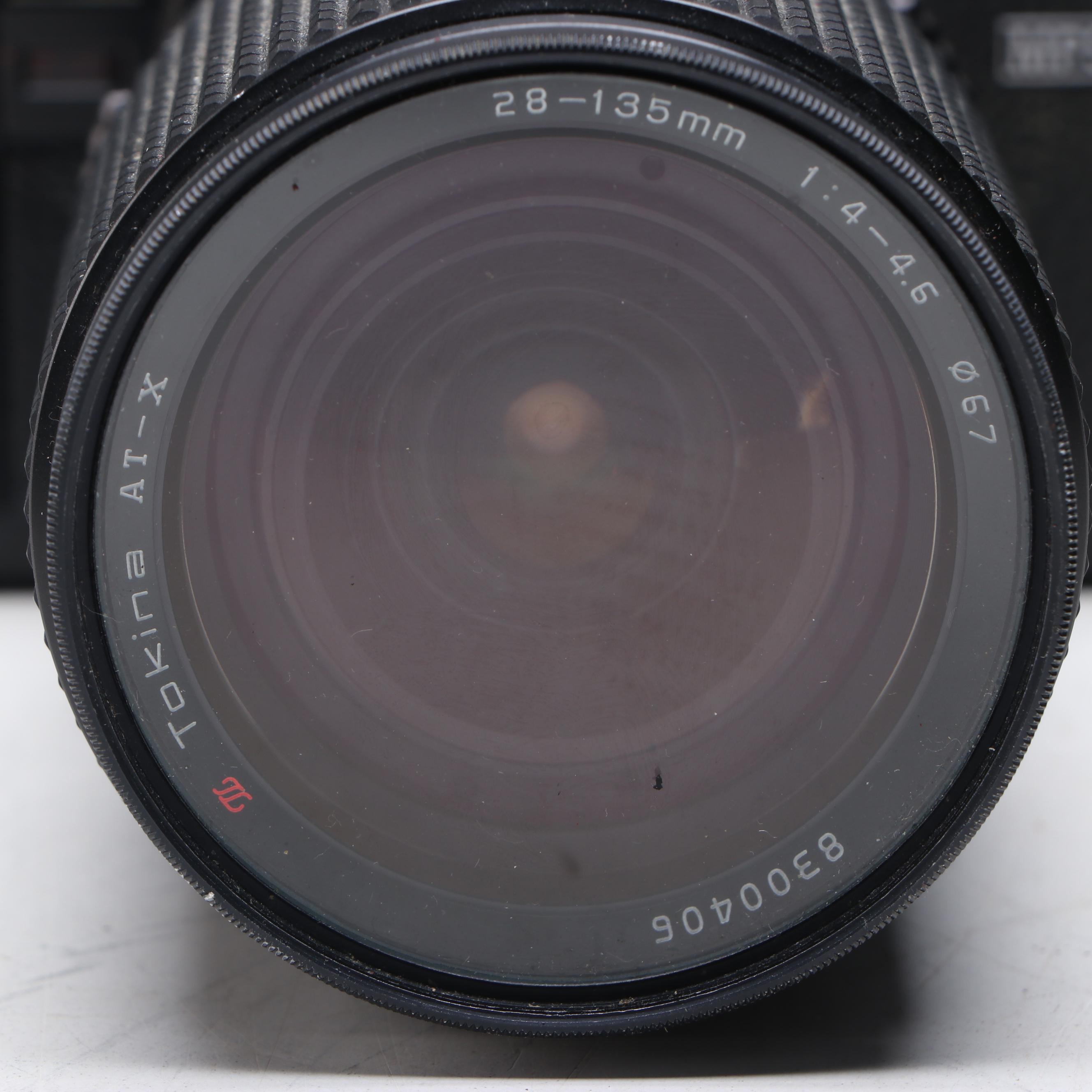 Minolta X-700 SLR Camera with Camera Bag, Flash and More Accessories