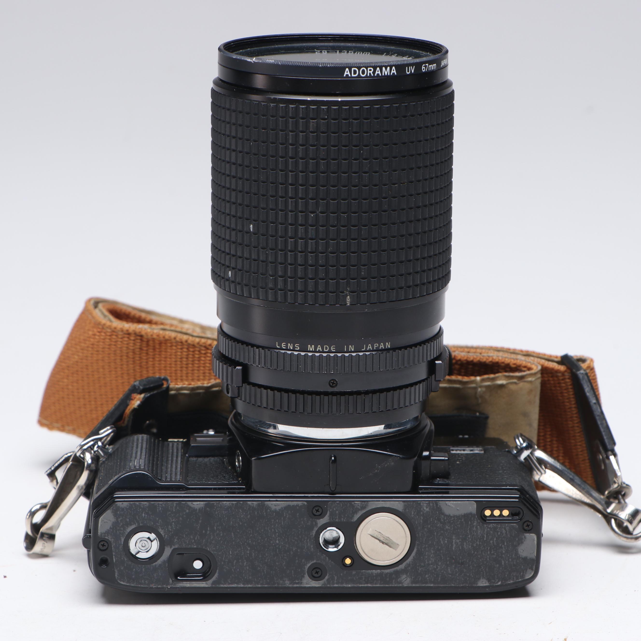 Minolta X-700 SLR Camera with Camera Bag, Flash and More Accessories