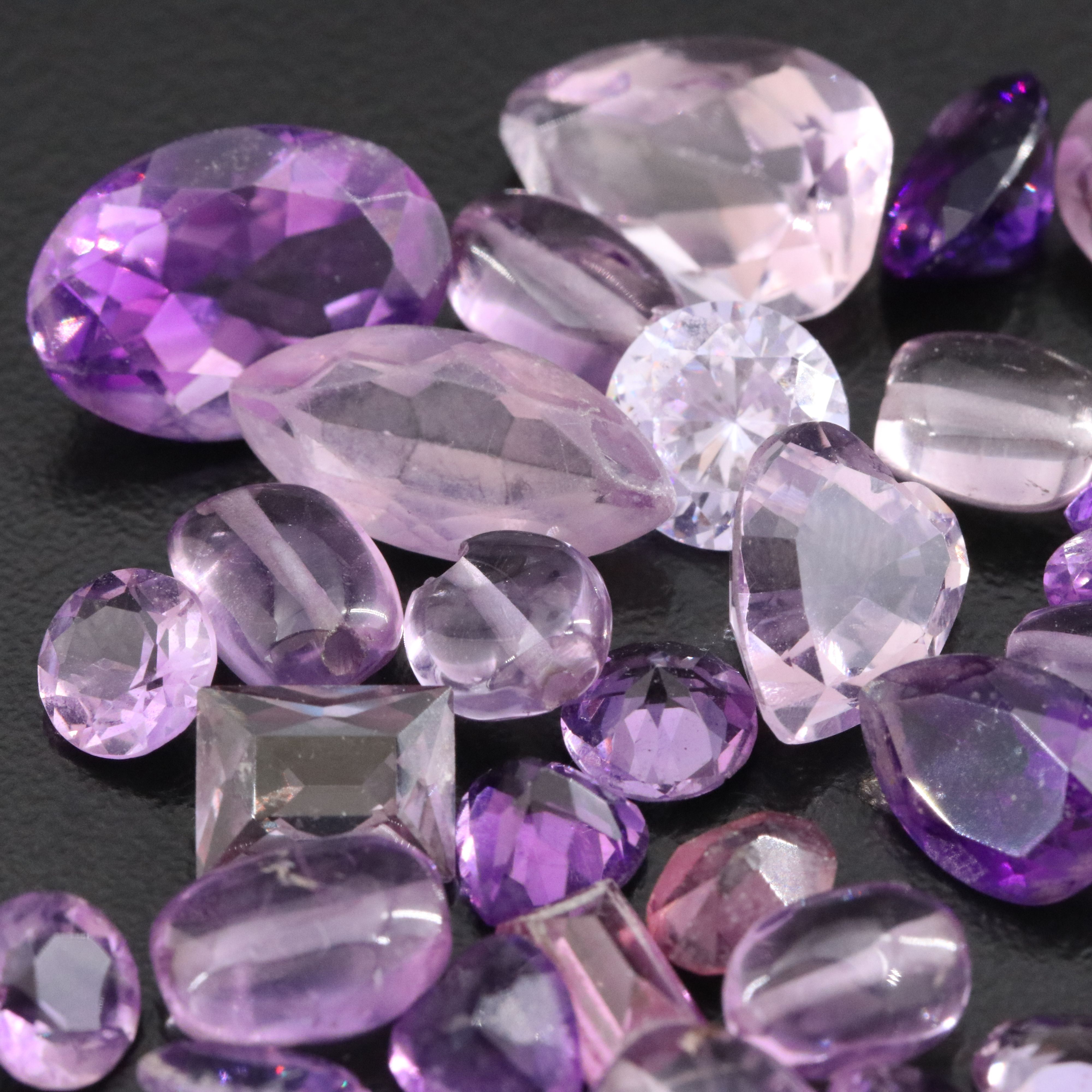 Loose 86.81 CTW Gemstones Featuring Amethyst, CZ and Glass