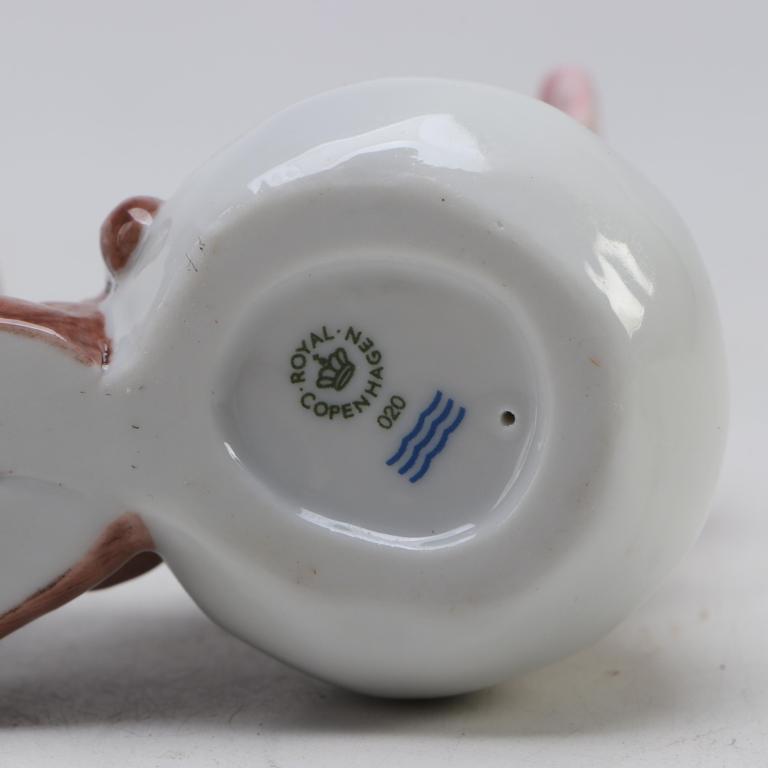 Royal Copenhagen "Snowman Boy with Teddy" and "Snowman Girl with Teddy" Figures