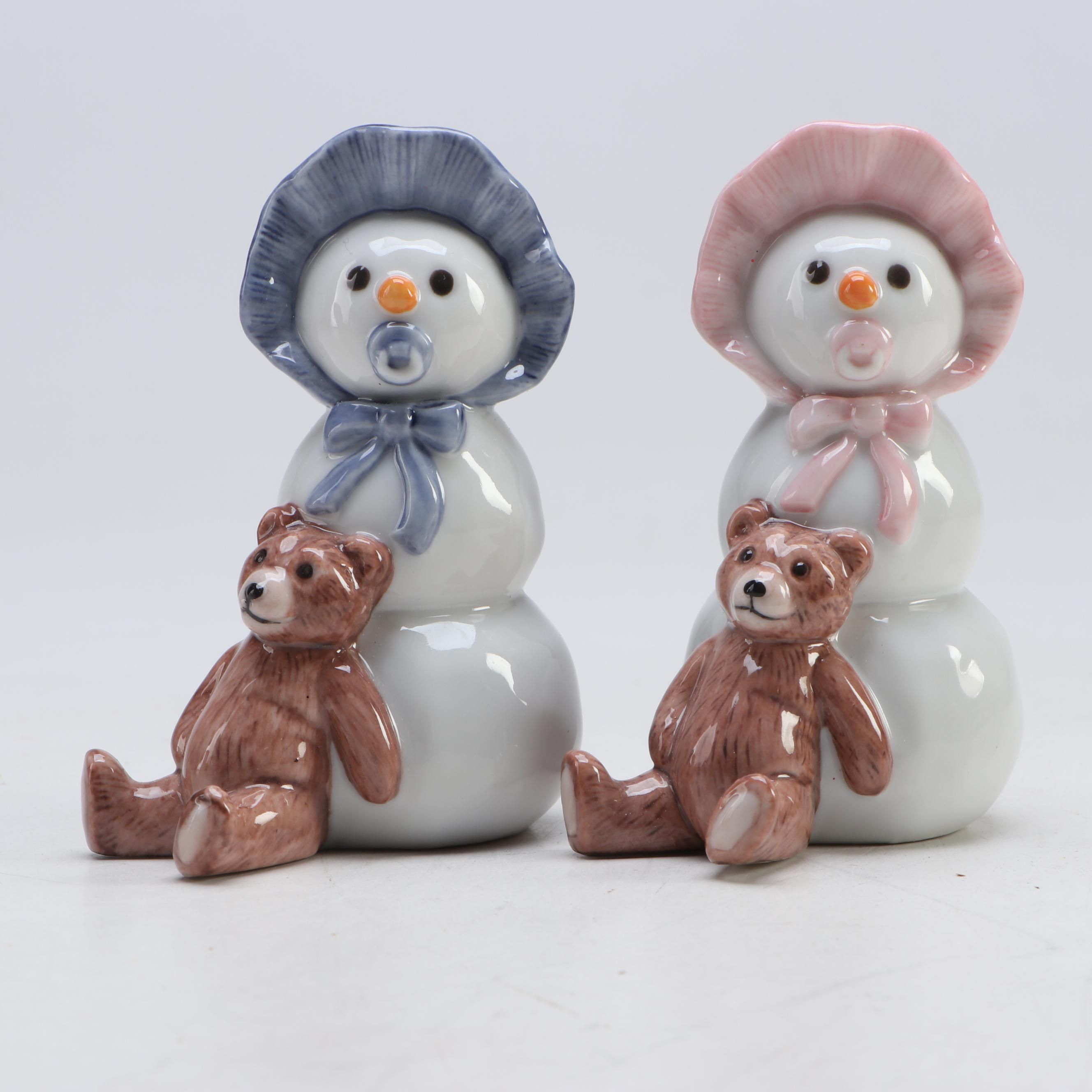Royal Copenhagen "Snowman Boy with Teddy" and "Snowman Girl with Teddy" Figures