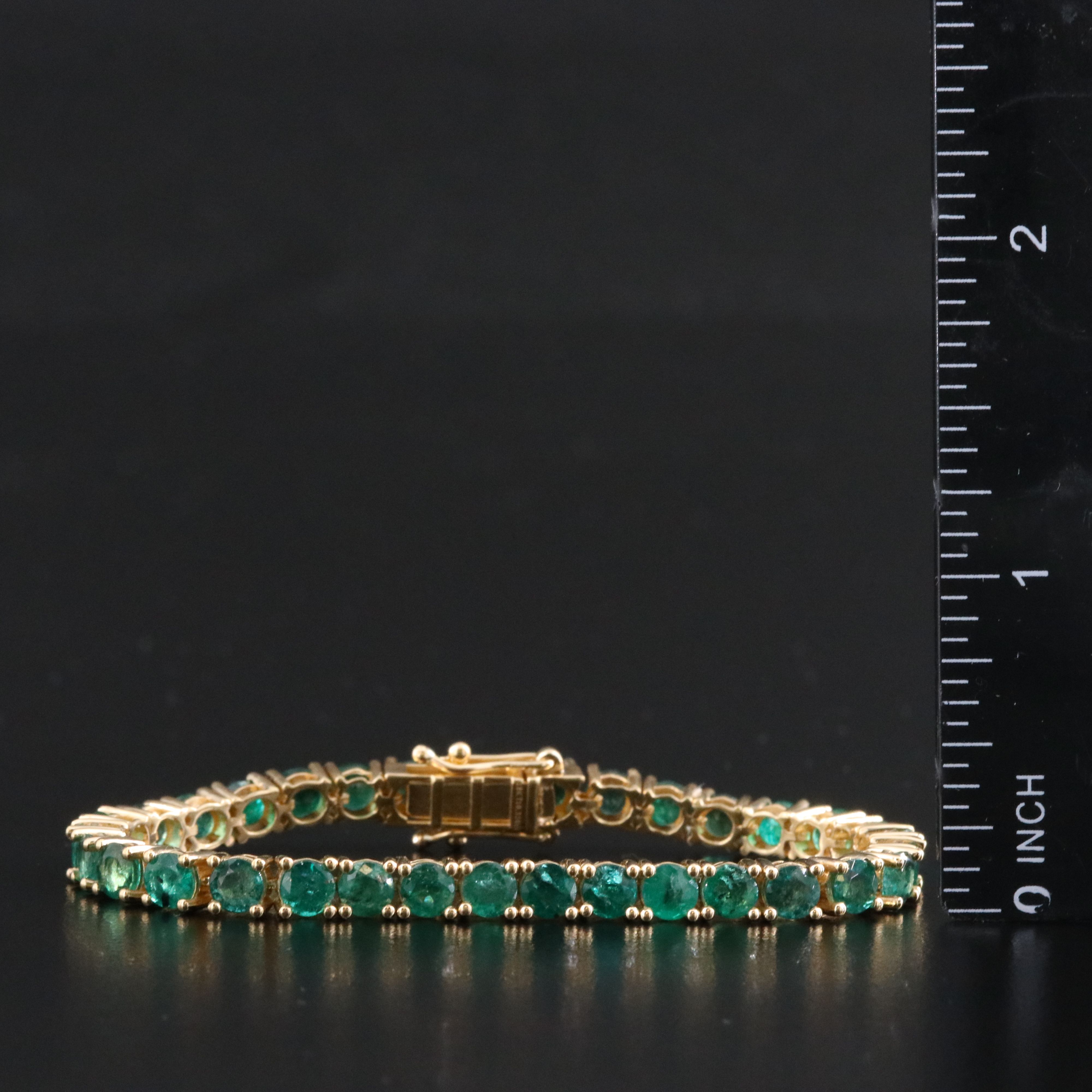 18K 10.32 CTW Emerald Line Bracelet