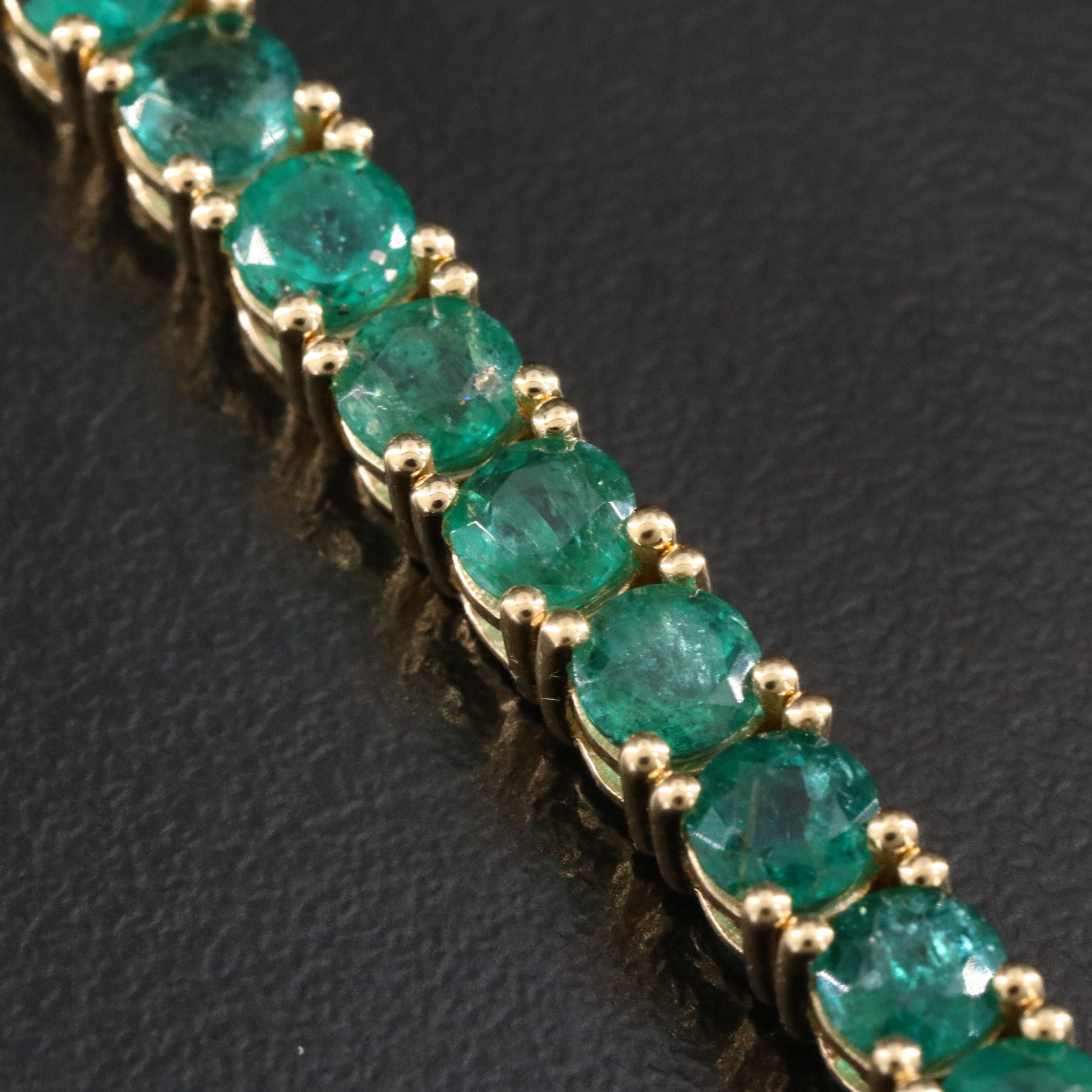18K 10.32 CTW Emerald Line Bracelet