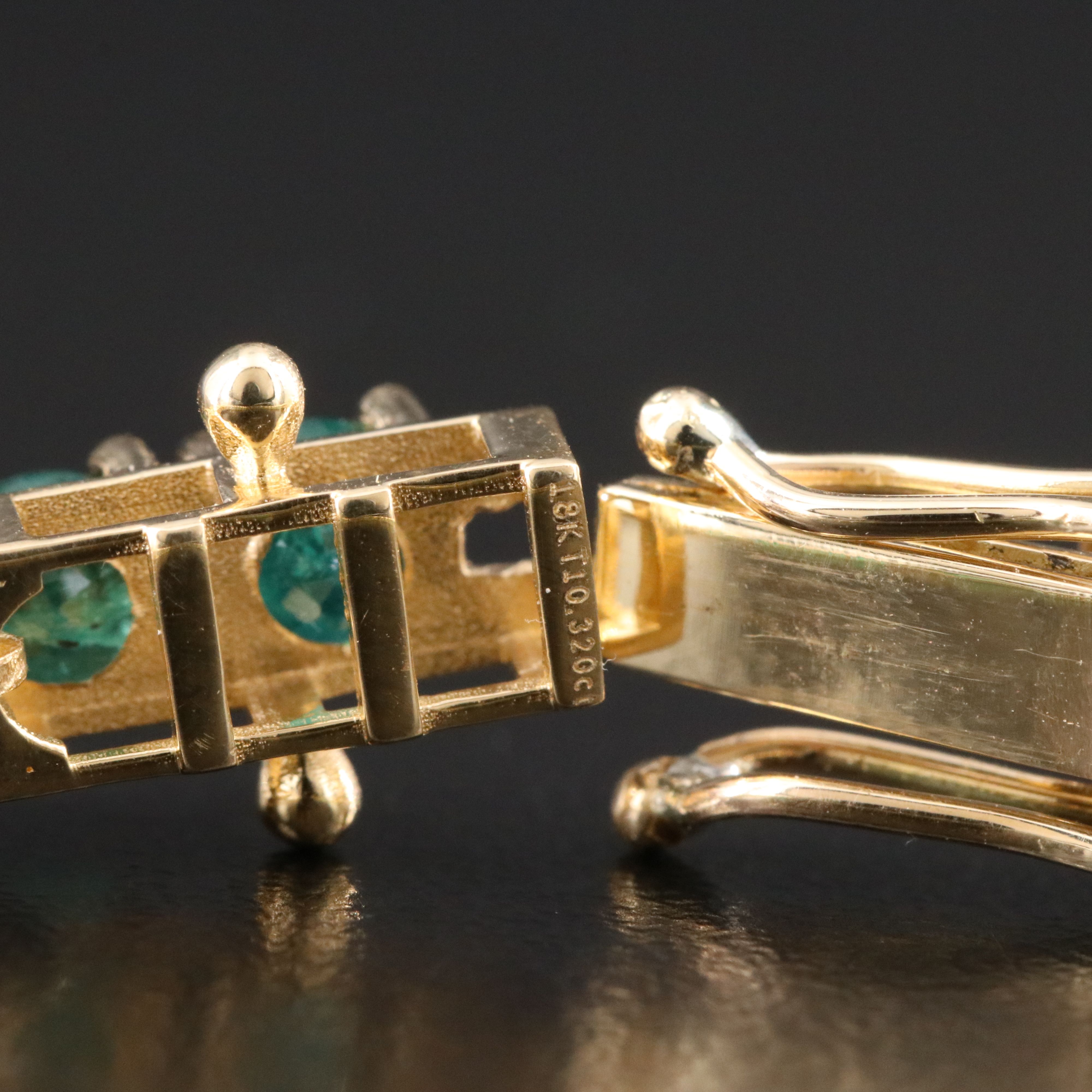 18K 10.32 CTW Emerald Line Bracelet