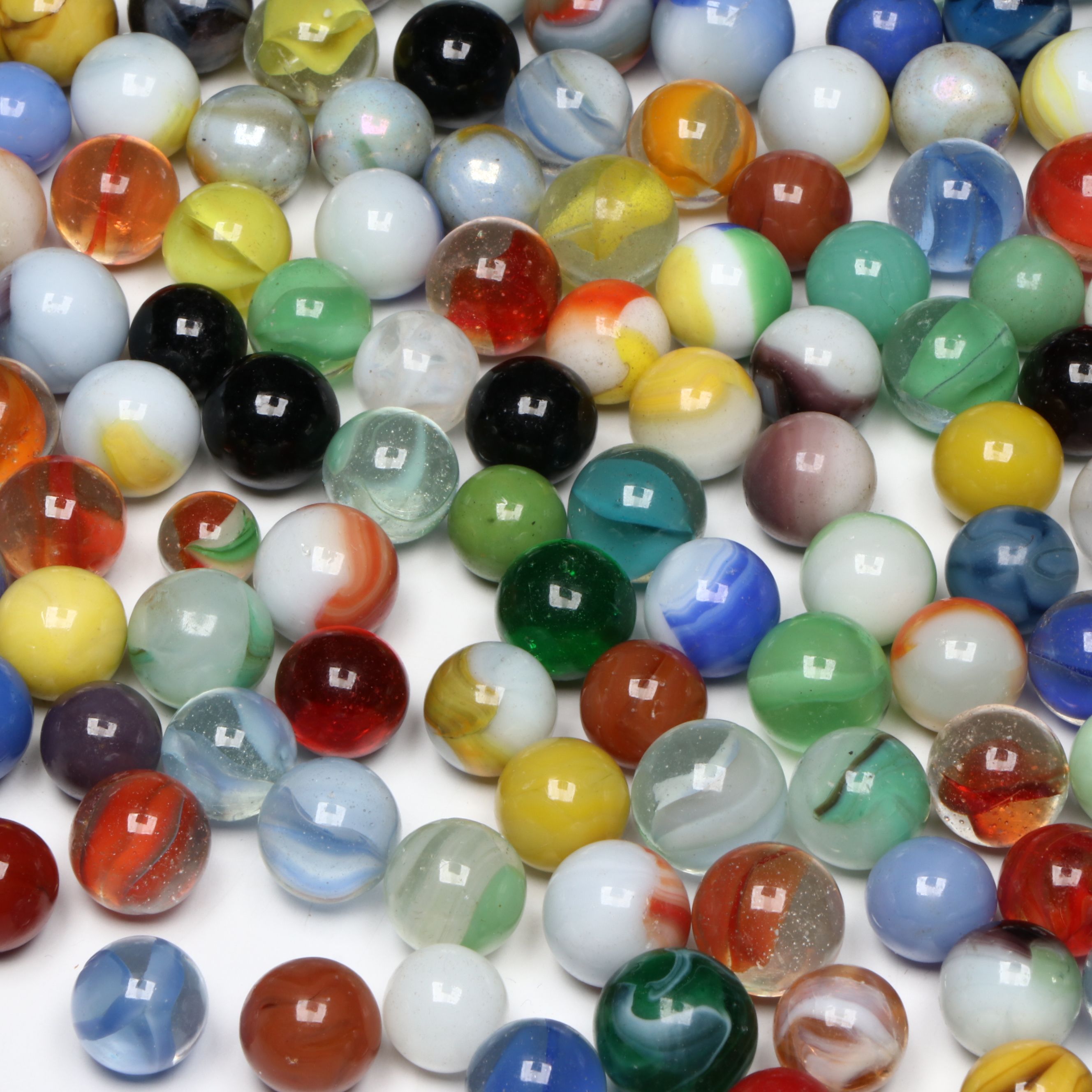 Akro Agate and Other Uranium, Iridescent, and More Vintage Marbles