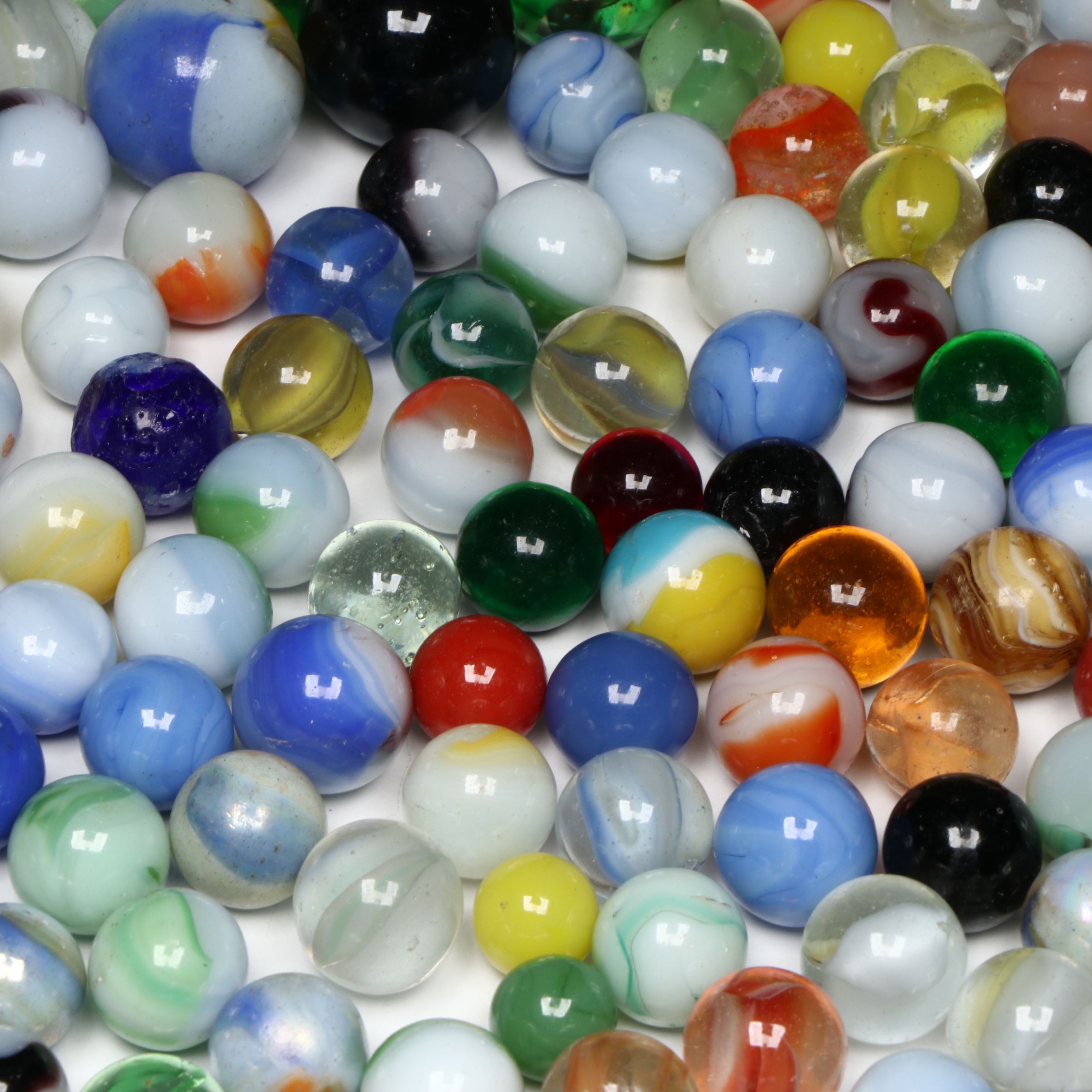 Akro Agate and Other Uranium, Iridescent, and More Vintage Marbles