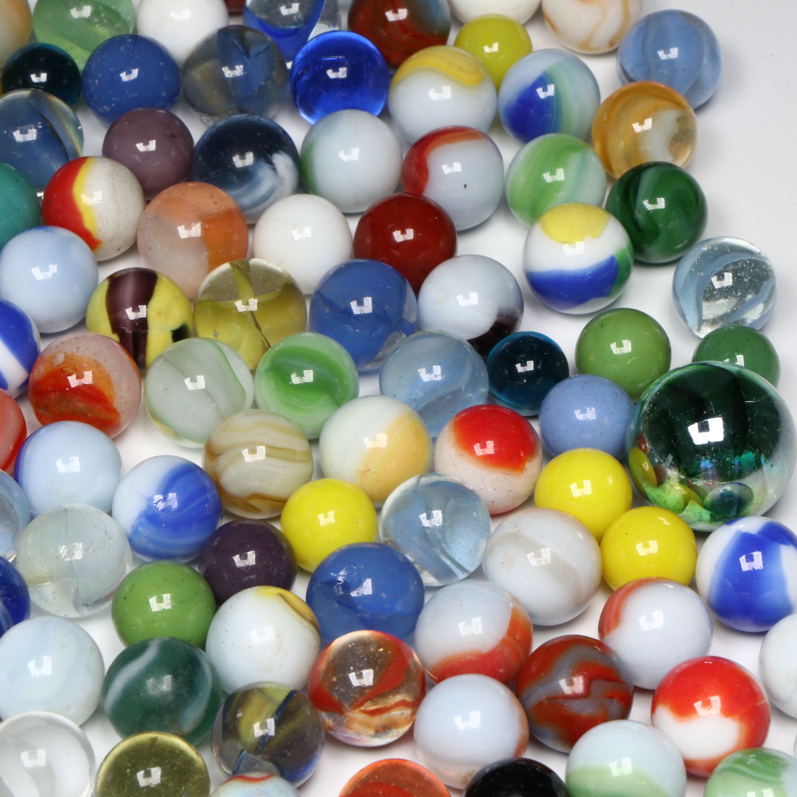 Akro Agate and Other Uranium, Iridescent, and More Vintage Marbles