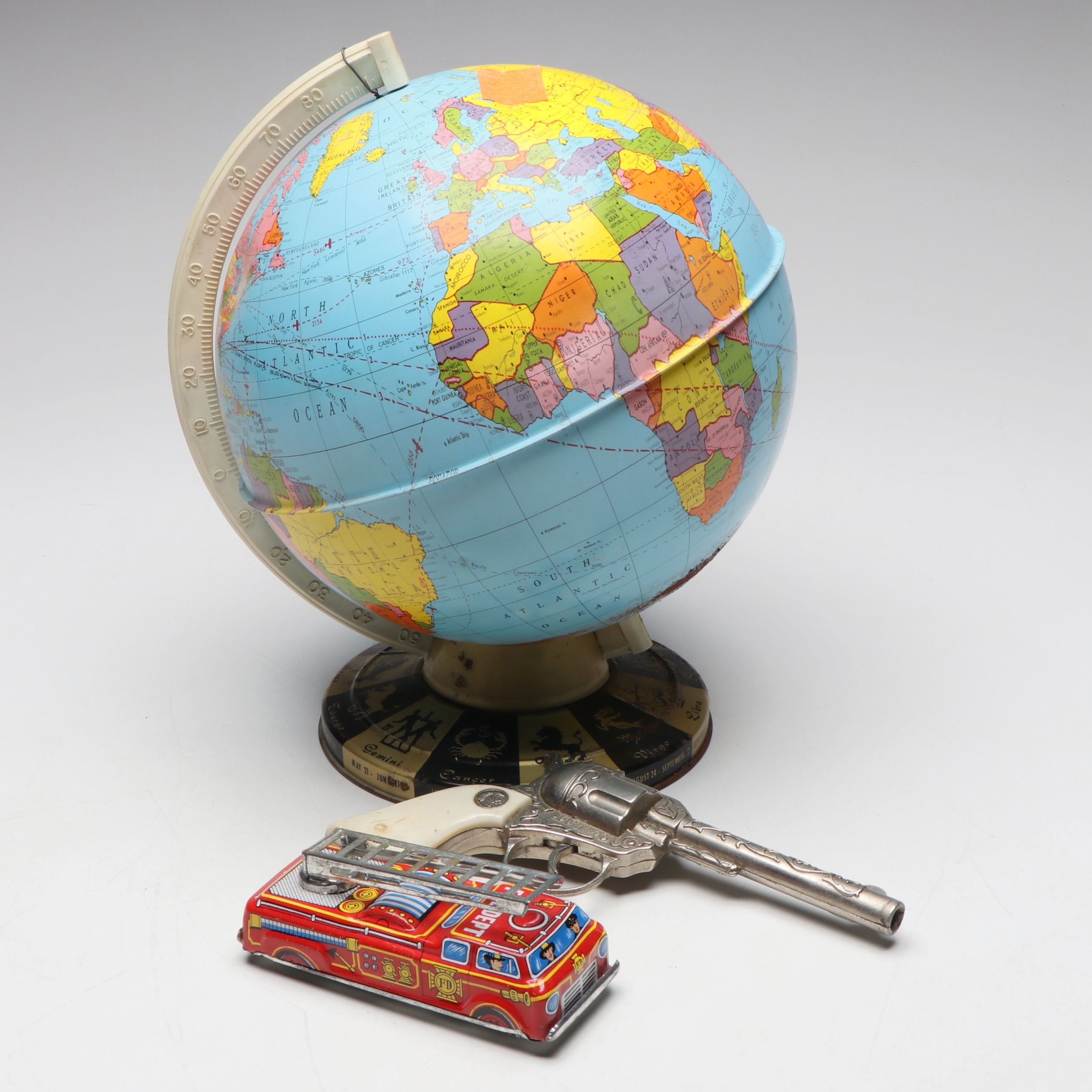 Ohio Art Co. Zodiac Desk Globe with Friction Fire Truck and Cap Gun