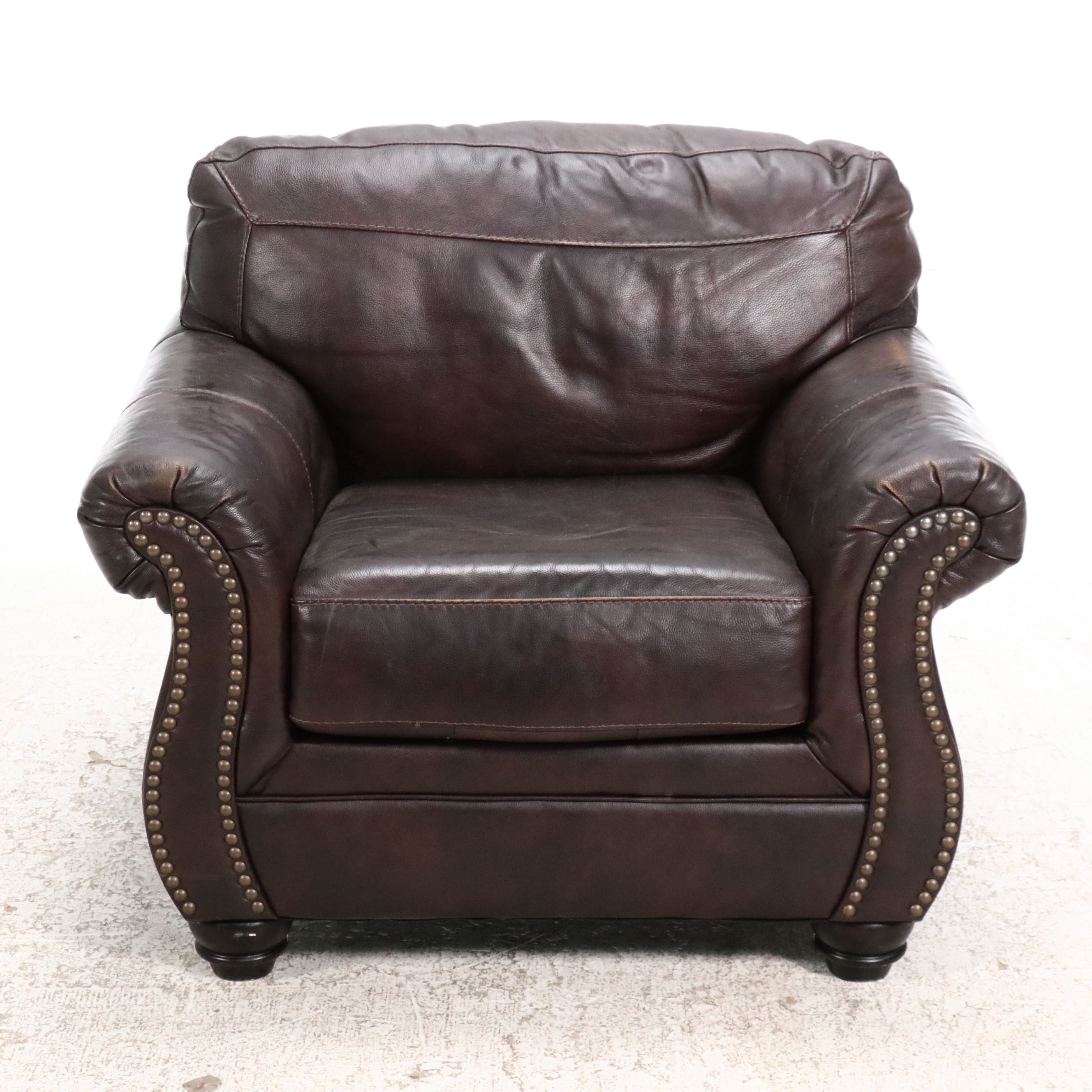 Ashley Furniture Leather Armchair with Nailhead Trim