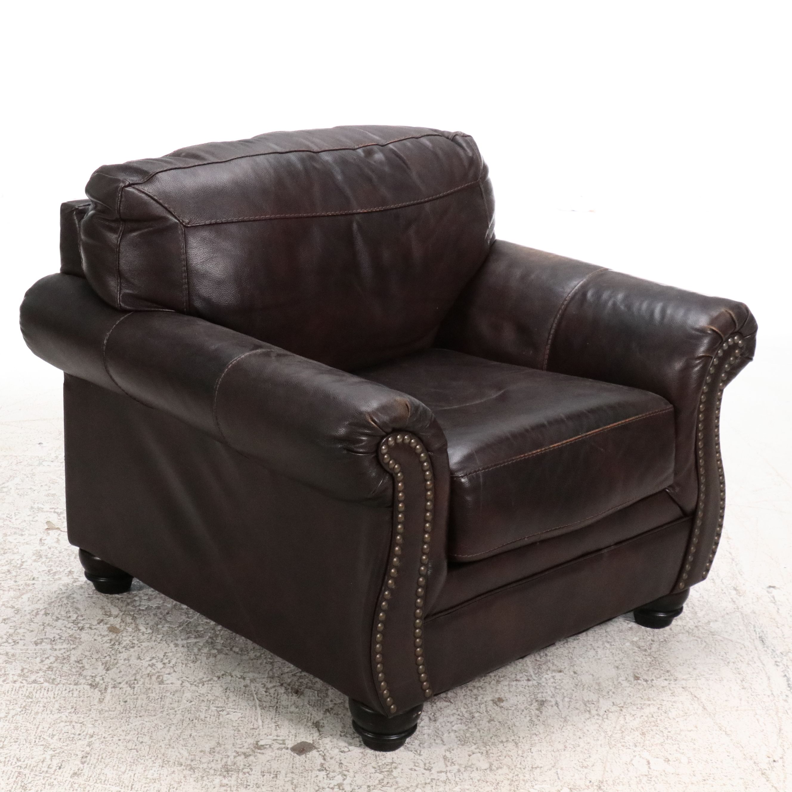 Ashley Furniture Leather Armchair with Nailhead Trim