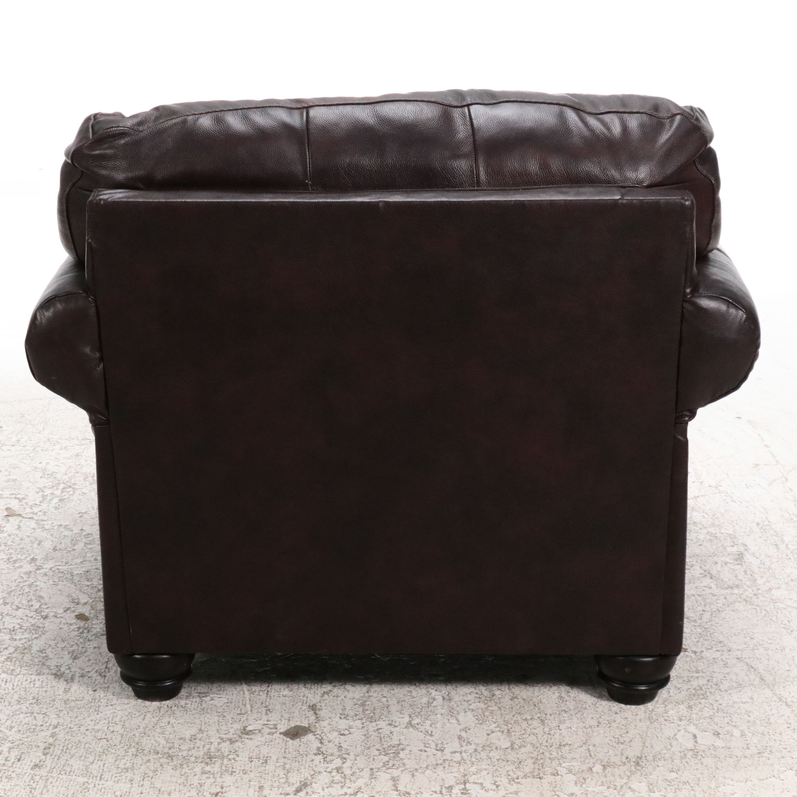 Ashley Furniture Leather Armchair with Nailhead Trim