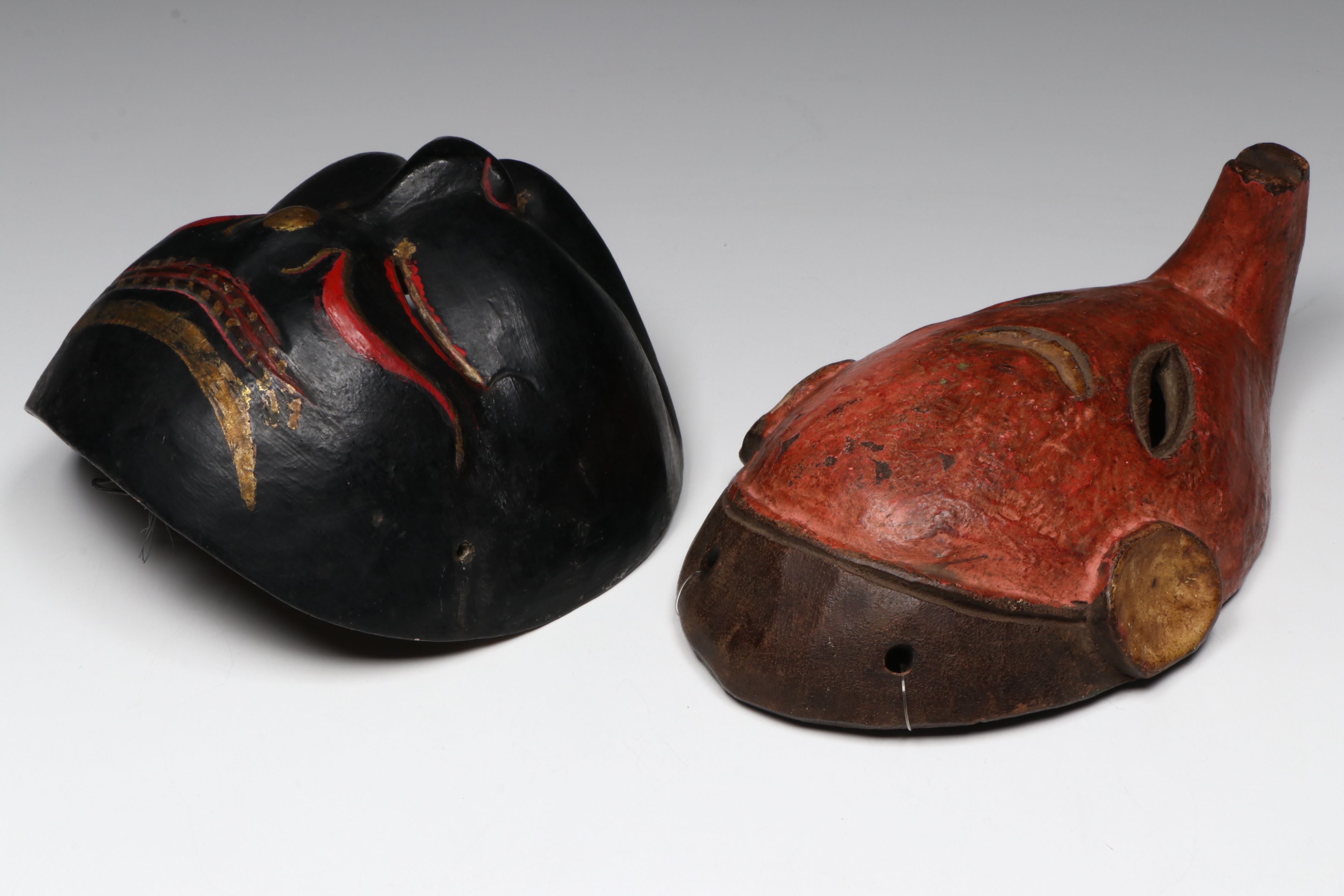 Vintage Chokwe Painted Pig Mask and Indonesian Wayang-Topeng Half Mask