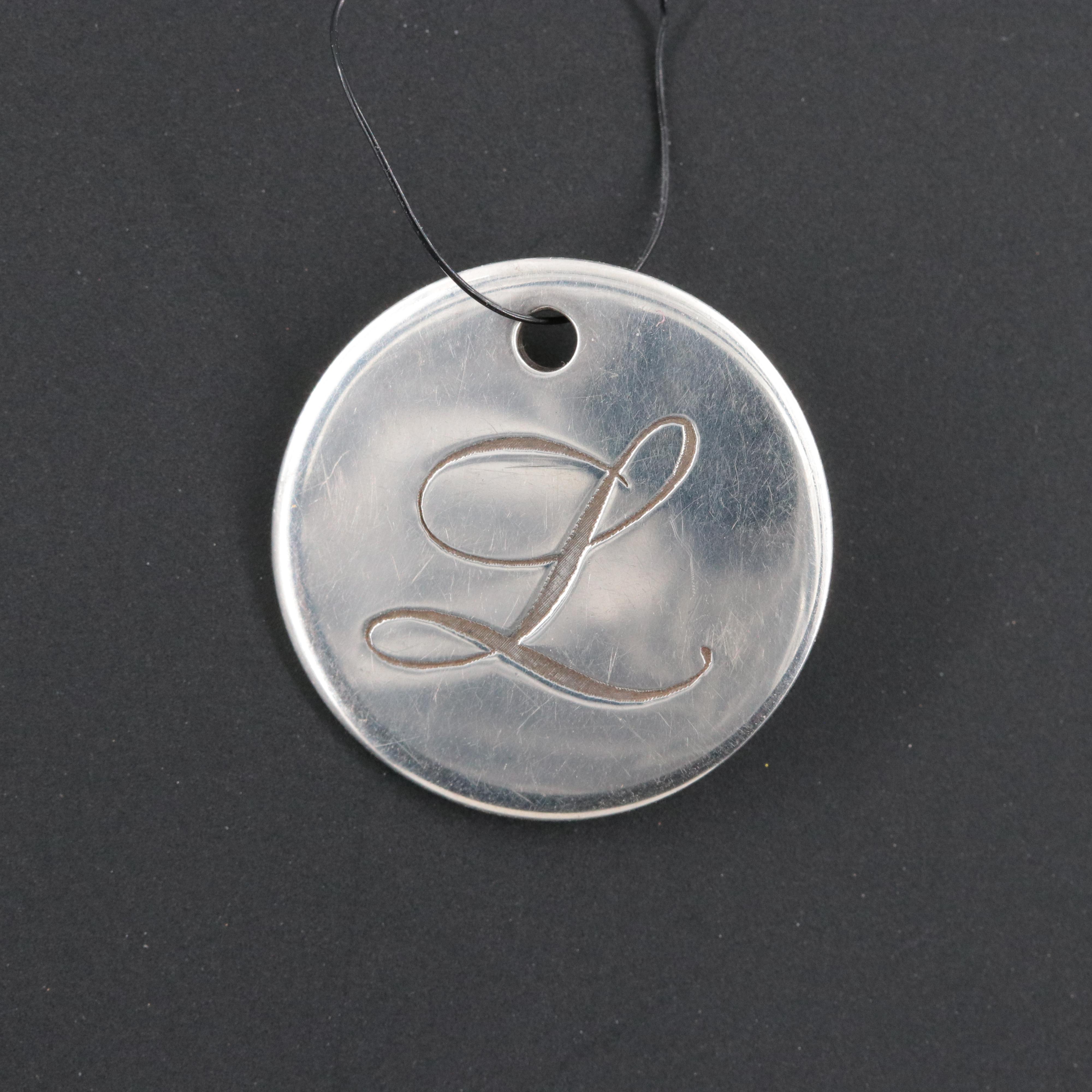 Tiffany & Co. Sterling Notes Alphabet Disc Charm Letter "L"