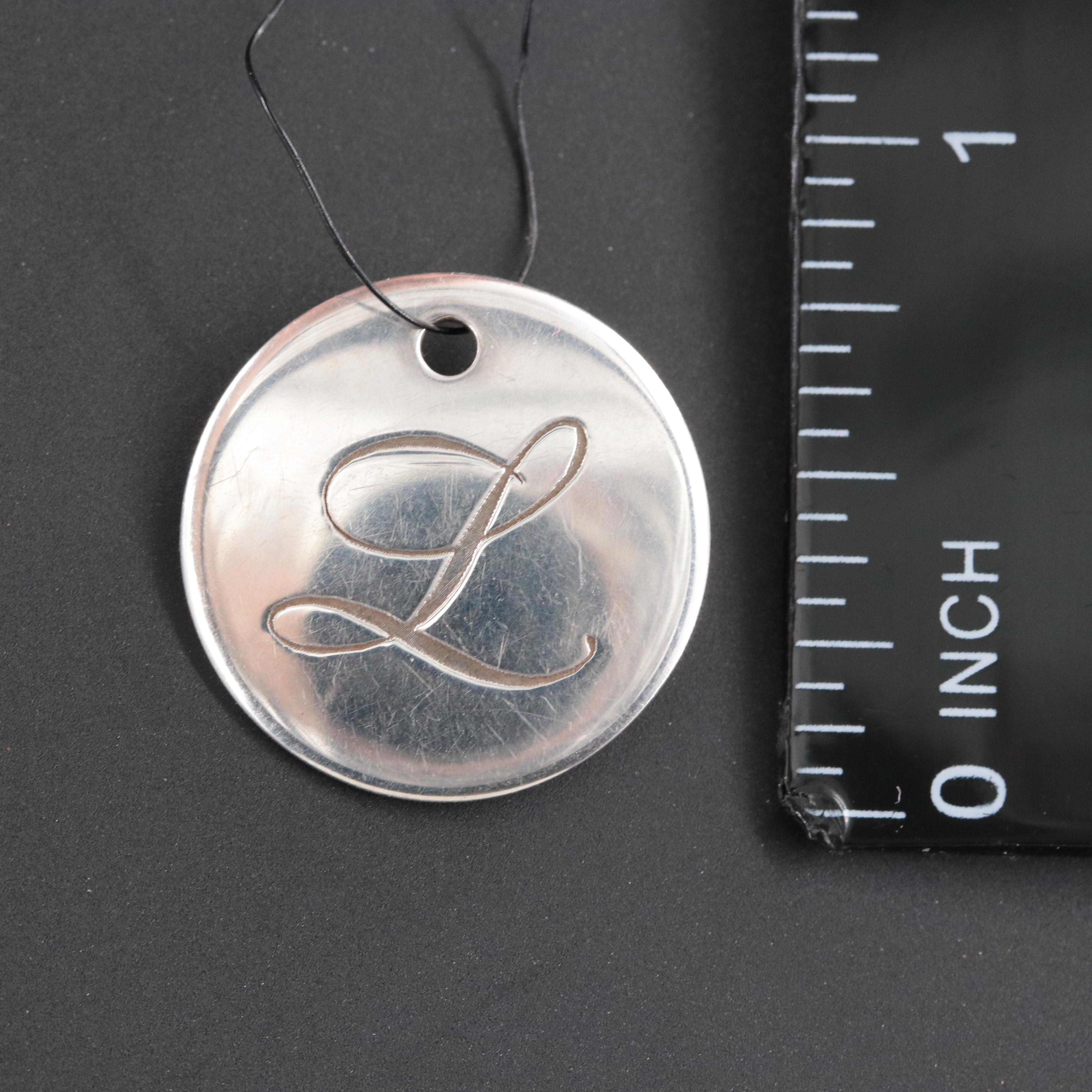 Tiffany & Co. Sterling Notes Alphabet Disc Charm Letter "L"