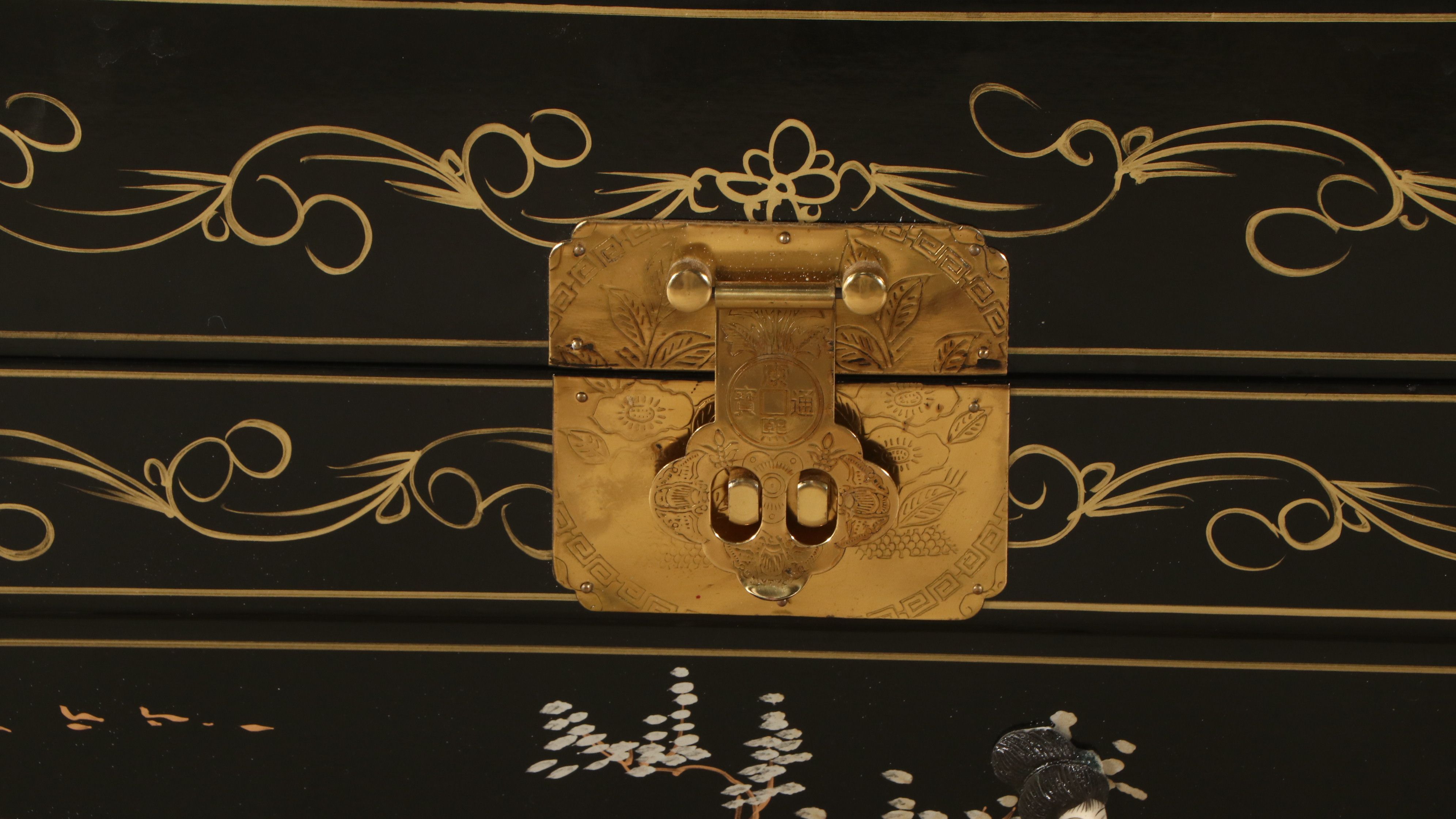 Chinese Lacquered Wood Trunk with Raised Decorations