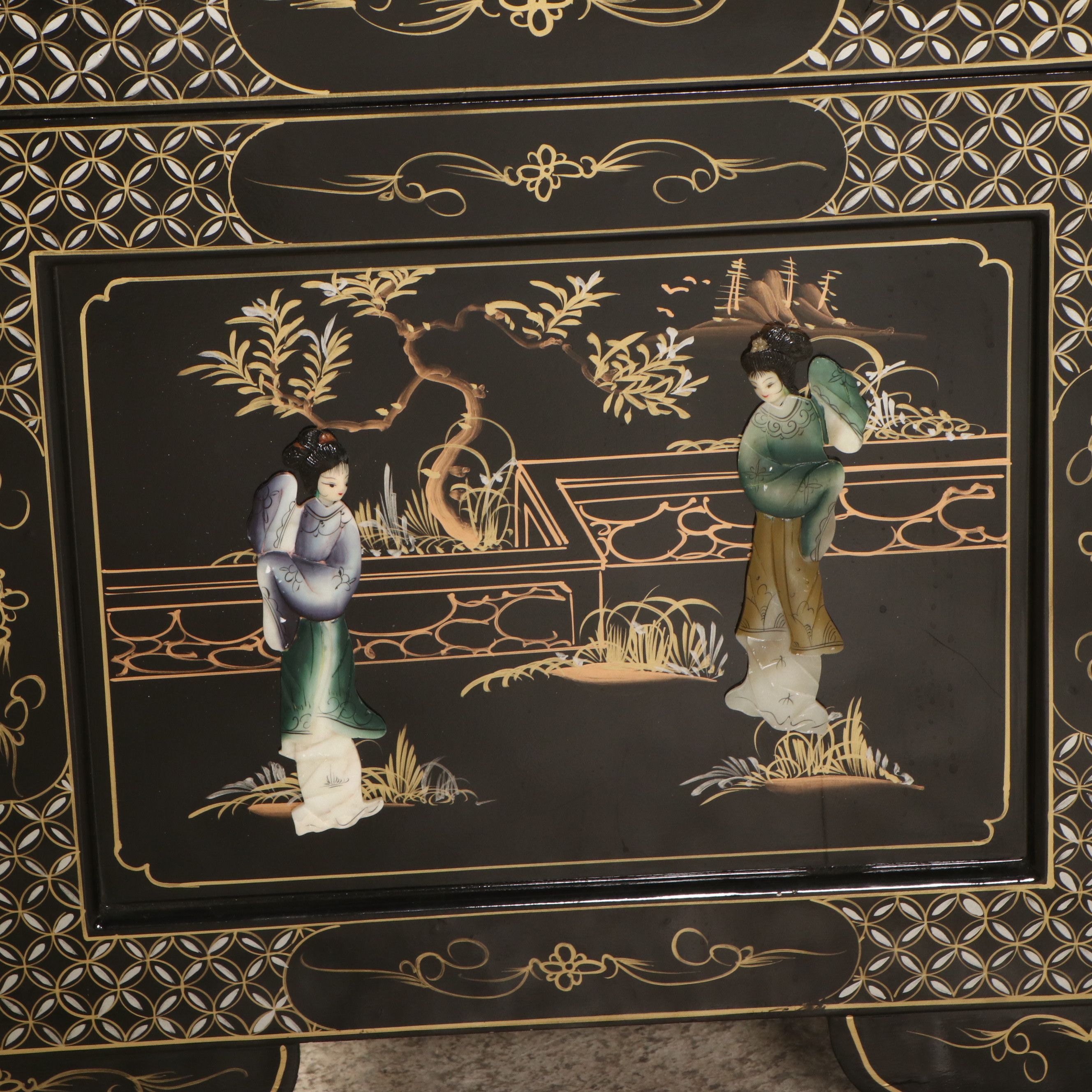 Chinese Lacquered Wood Trunk with Raised Decorations