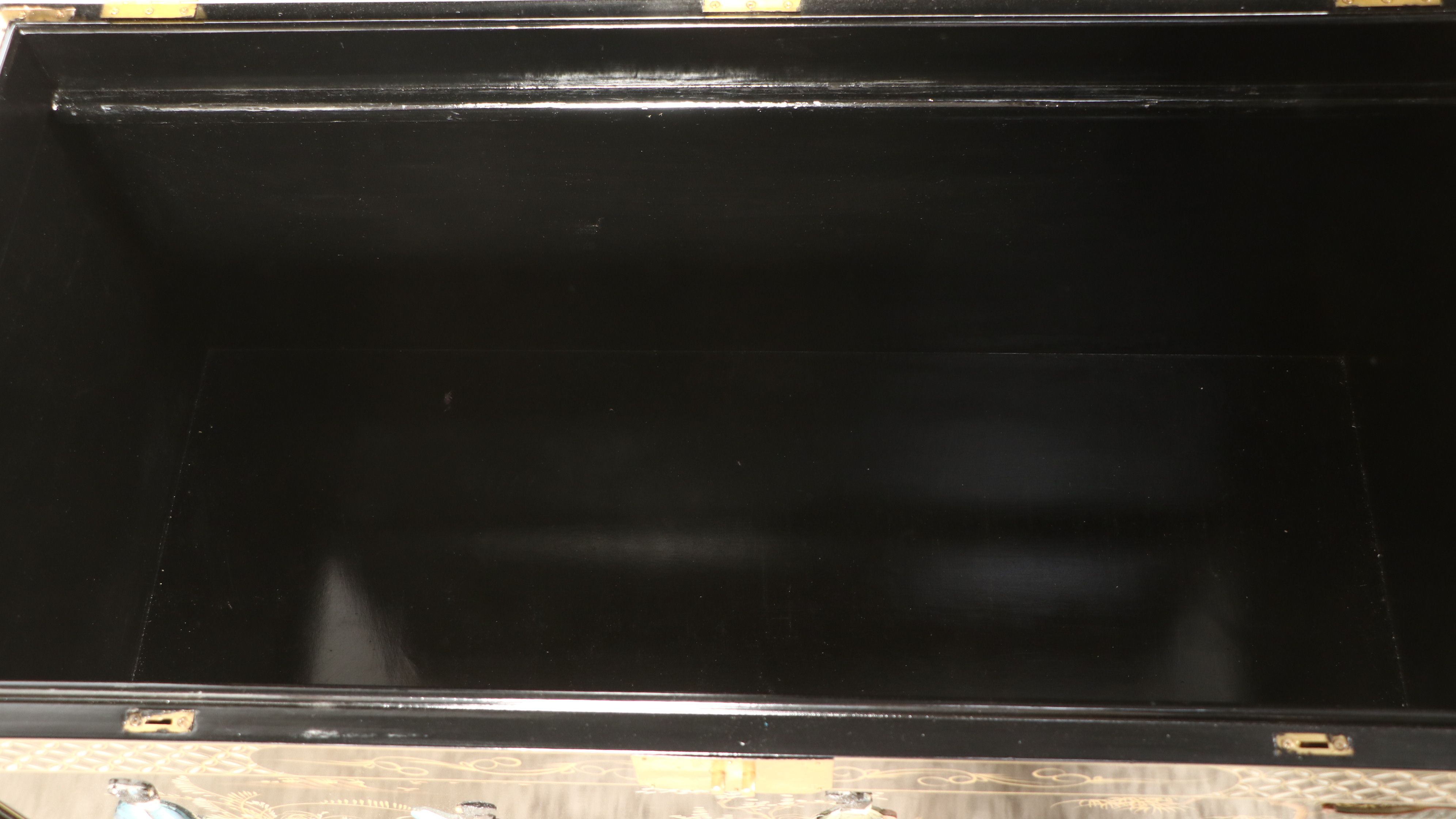 Chinese Lacquered Wood Trunk with Raised Decorations