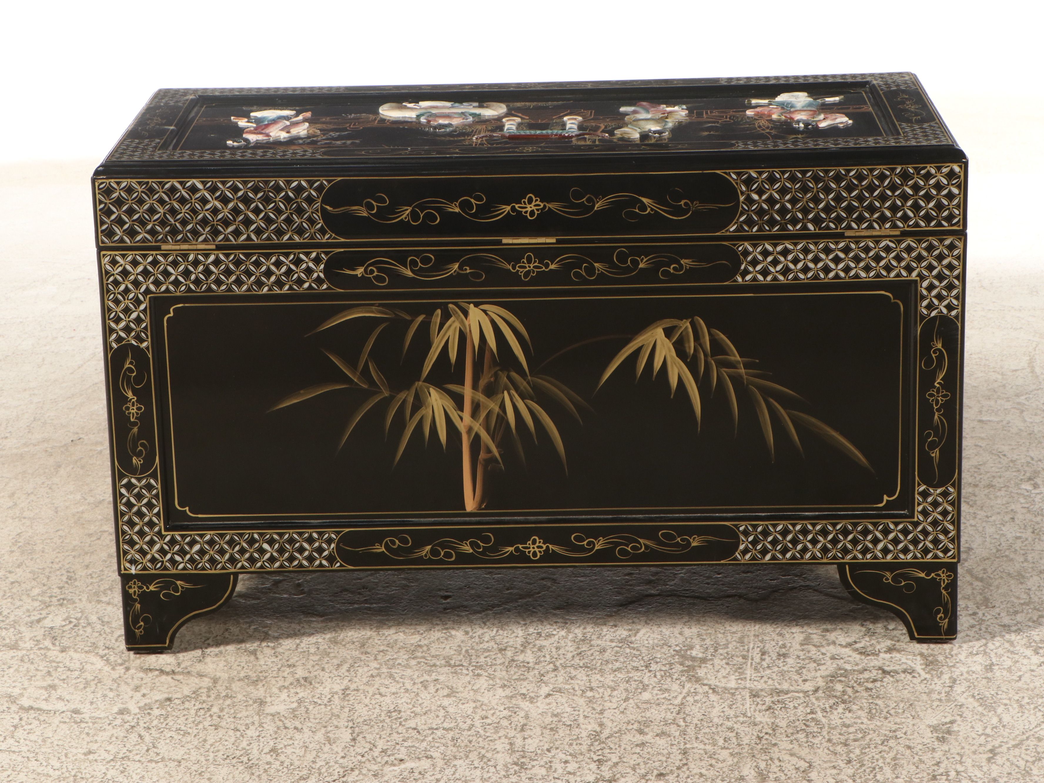 Chinese Lacquered Wood Trunk with Raised Decorations