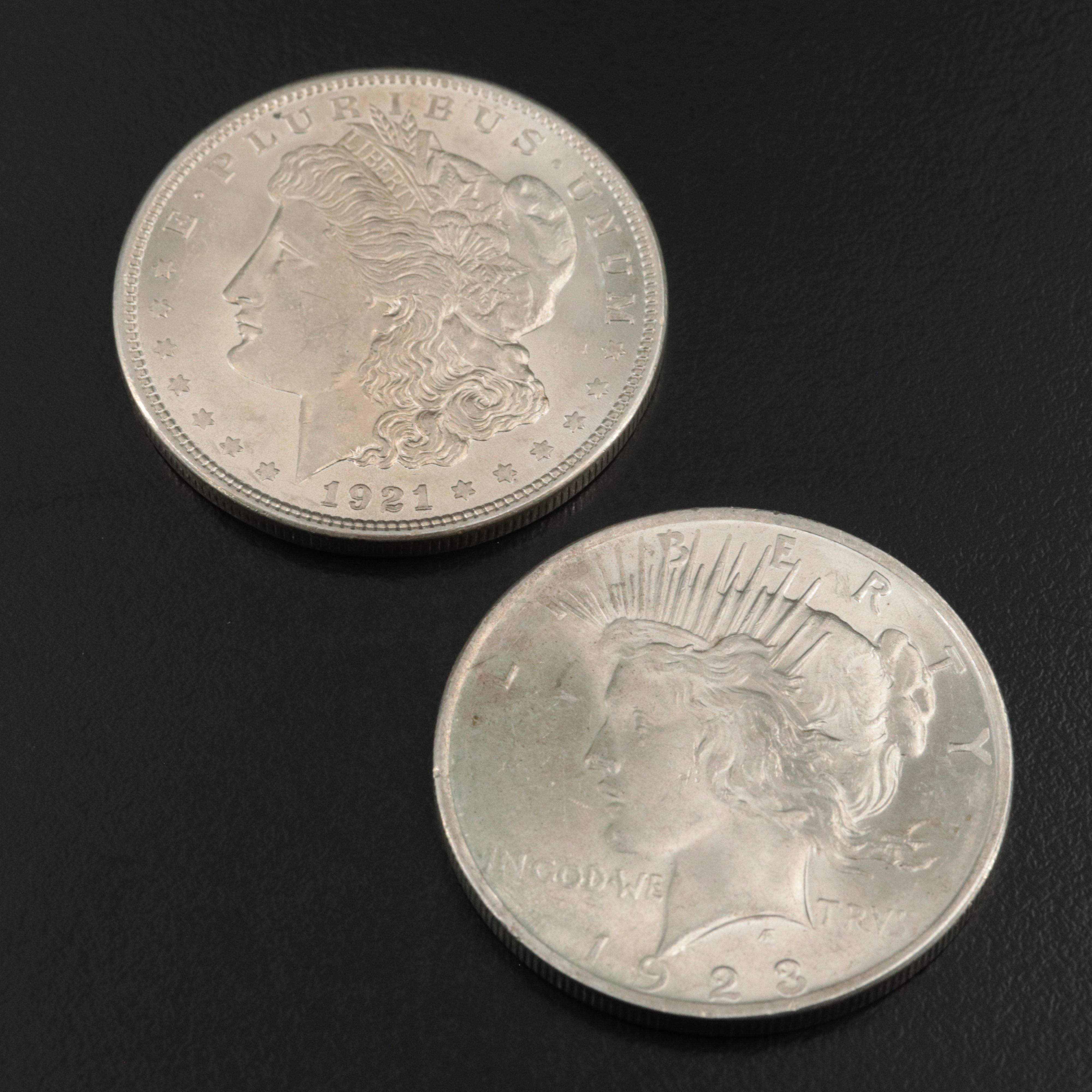 Two Uncirculated  U.S. Morgan and Peace Dollars