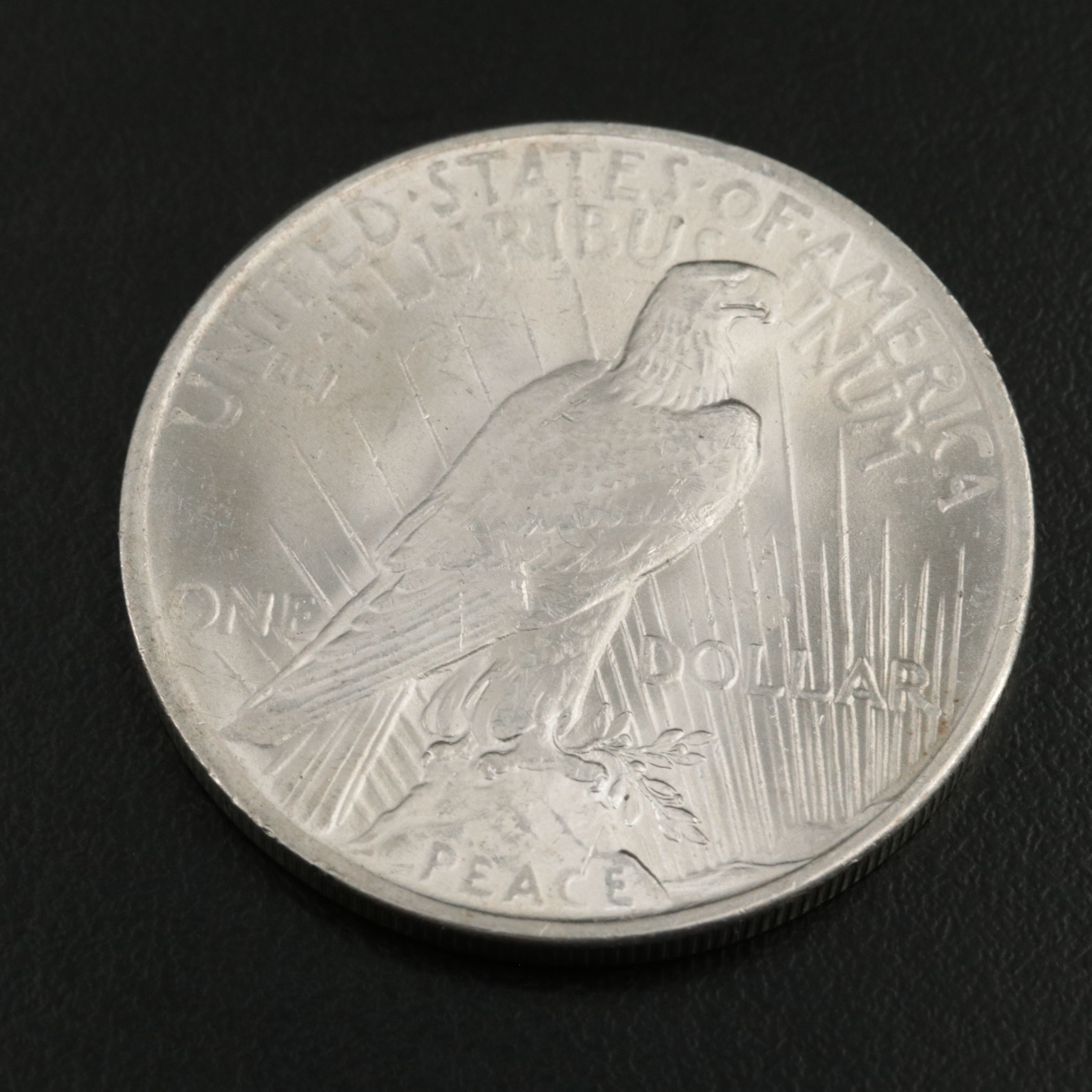 Two Uncirculated  U.S. Morgan and Peace Dollars