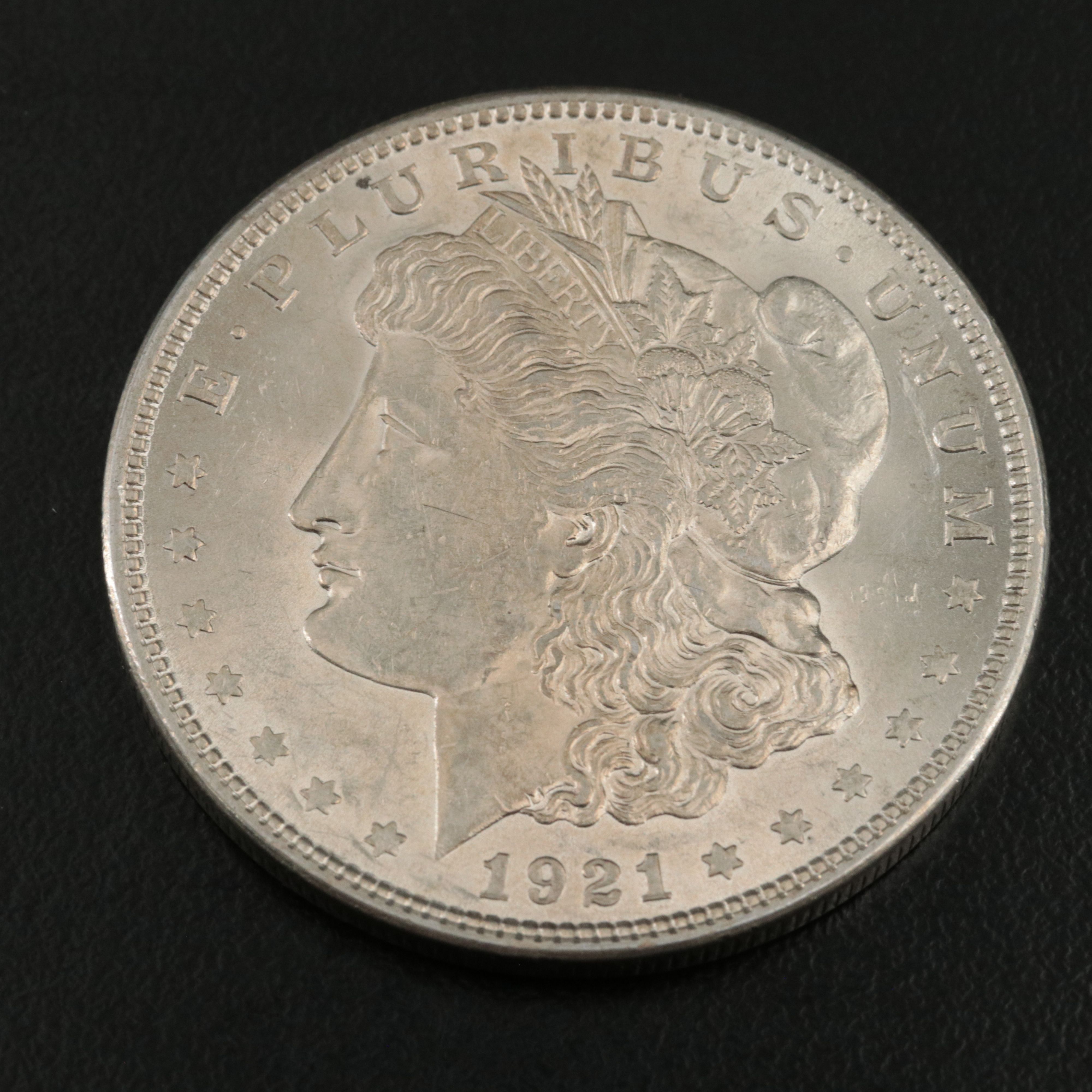 Two Uncirculated  U.S. Morgan and Peace Dollars