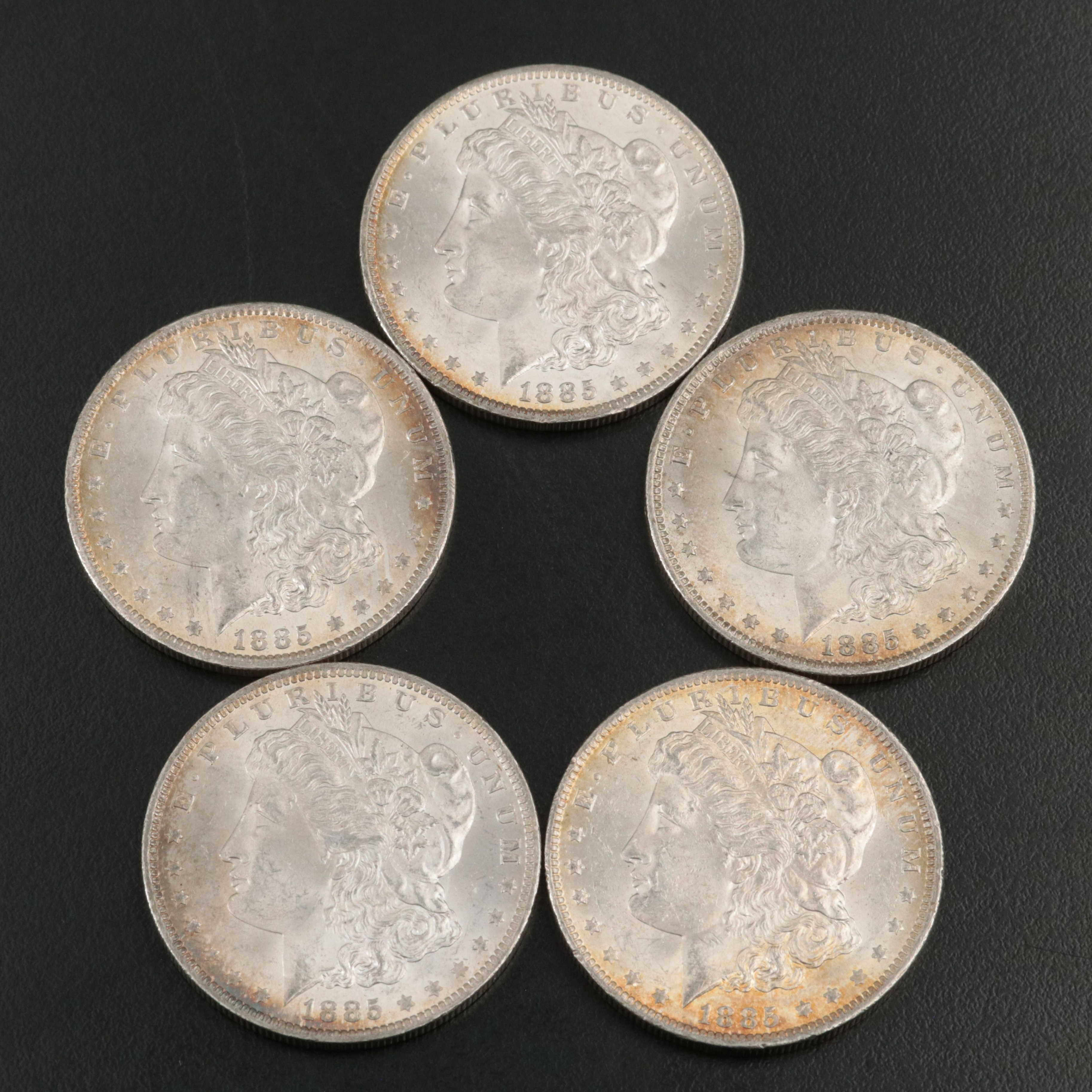 Five 1885-O Uncirculated Morgan Silver Dollars
