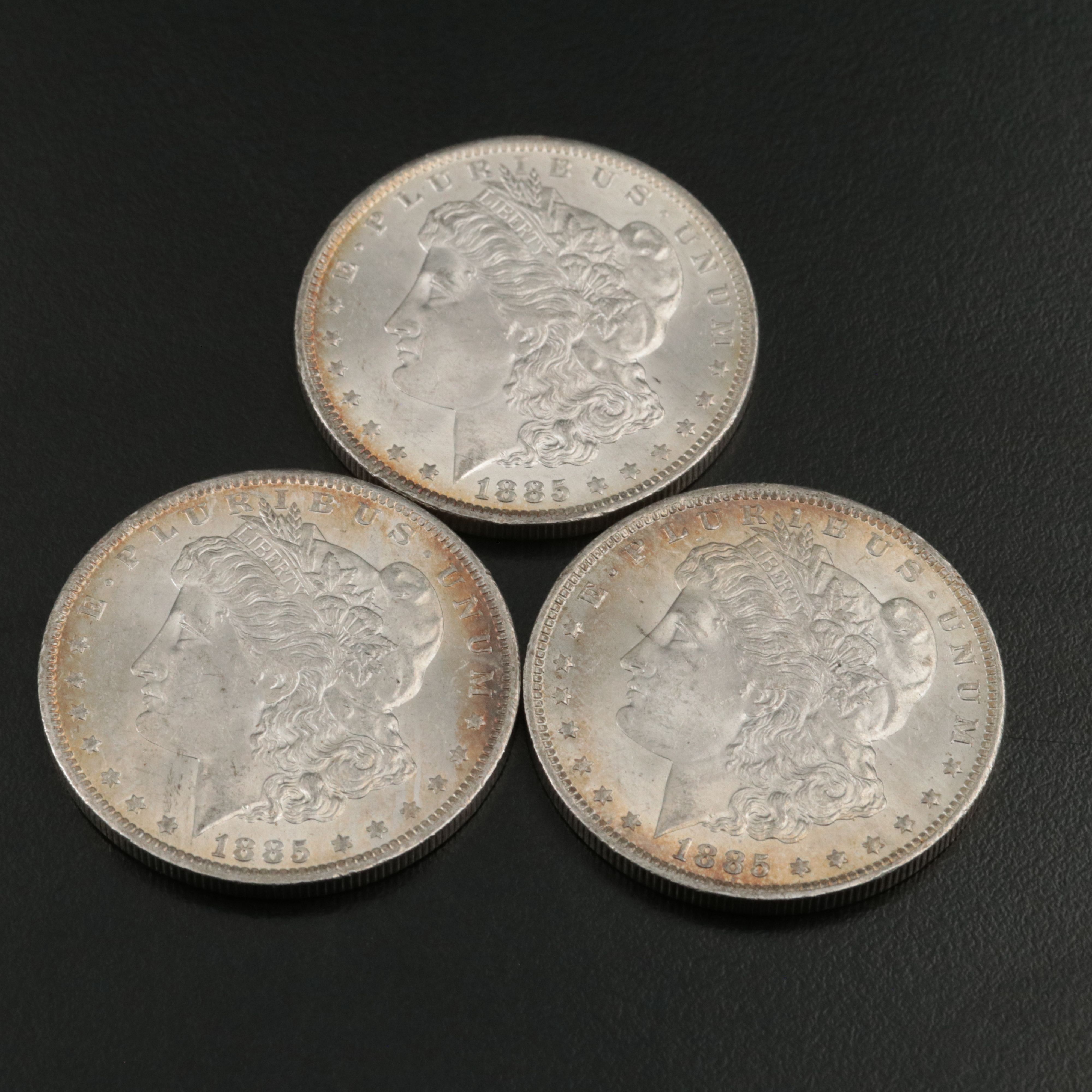 Five 1885-O Uncirculated Morgan Silver Dollars