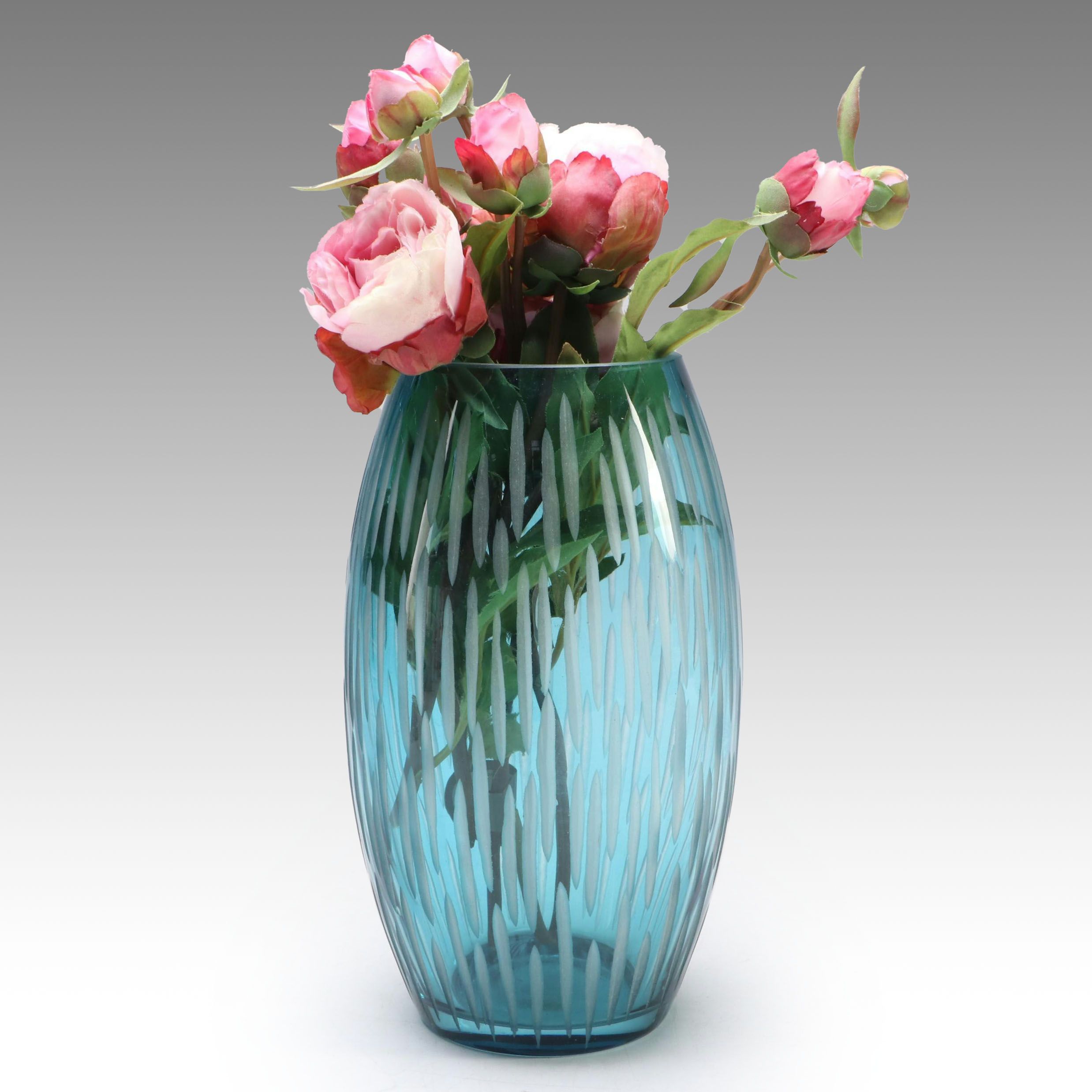 Oval-Shaped Blue Cut Glass Vase with Artificial Roses