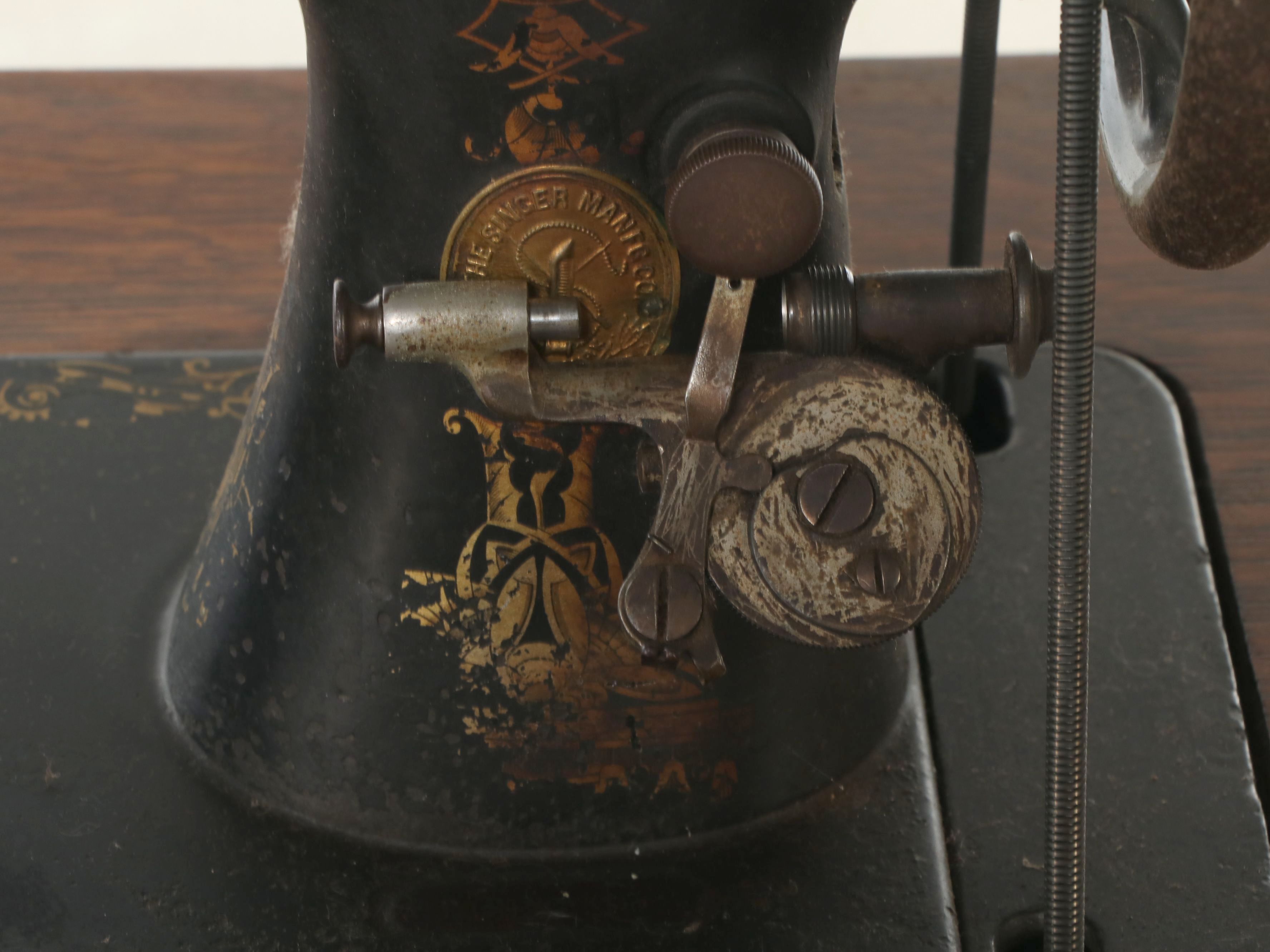 Singer Model 27 Treadle Sewing Machine with Oak Treadle Table, c. 1911