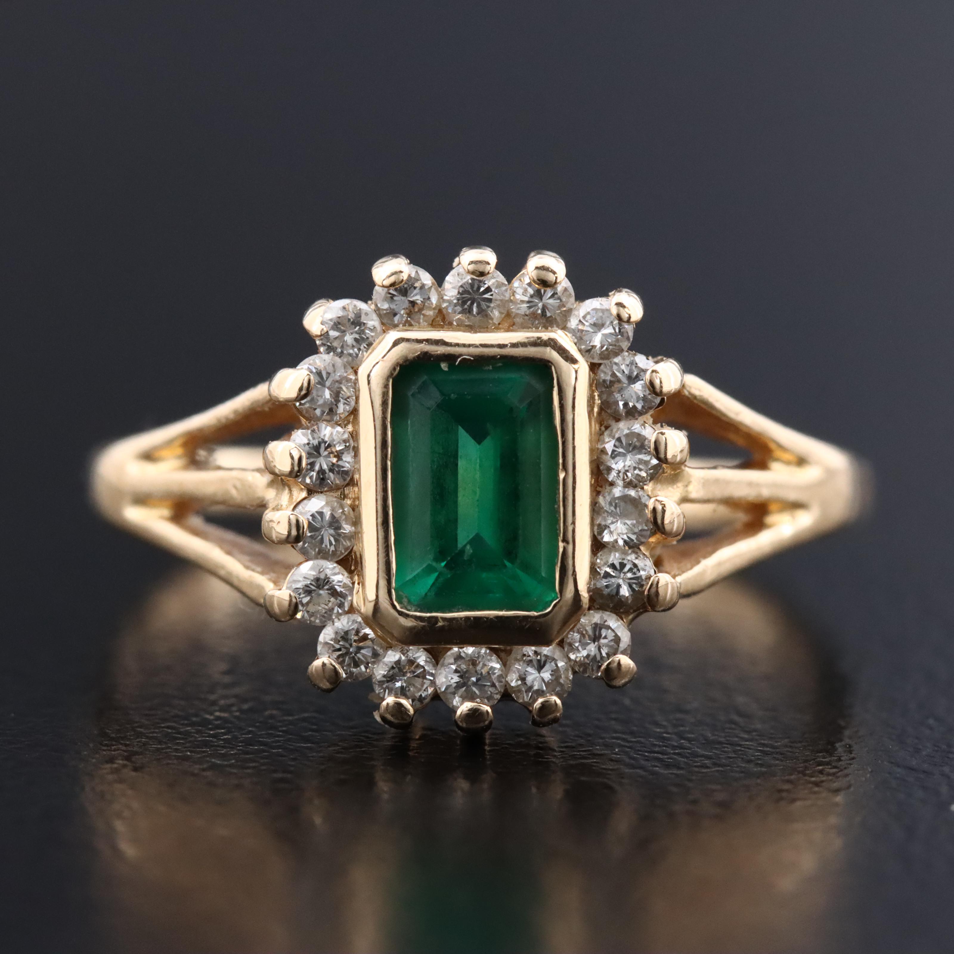 14K Emerald and Diamond Halo Ring