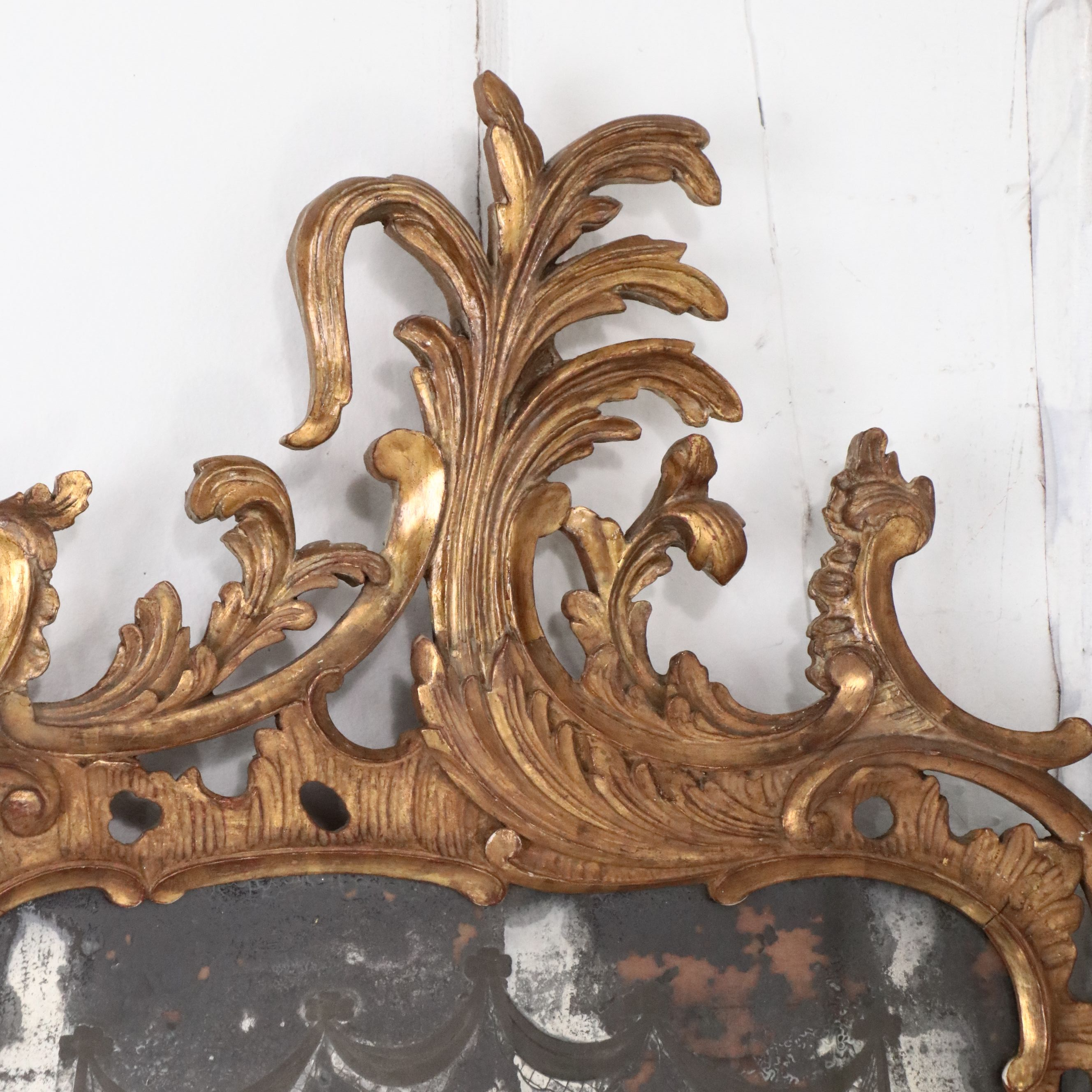 Pair of Louis XV Carved Giltwood Trumeau Mirrors