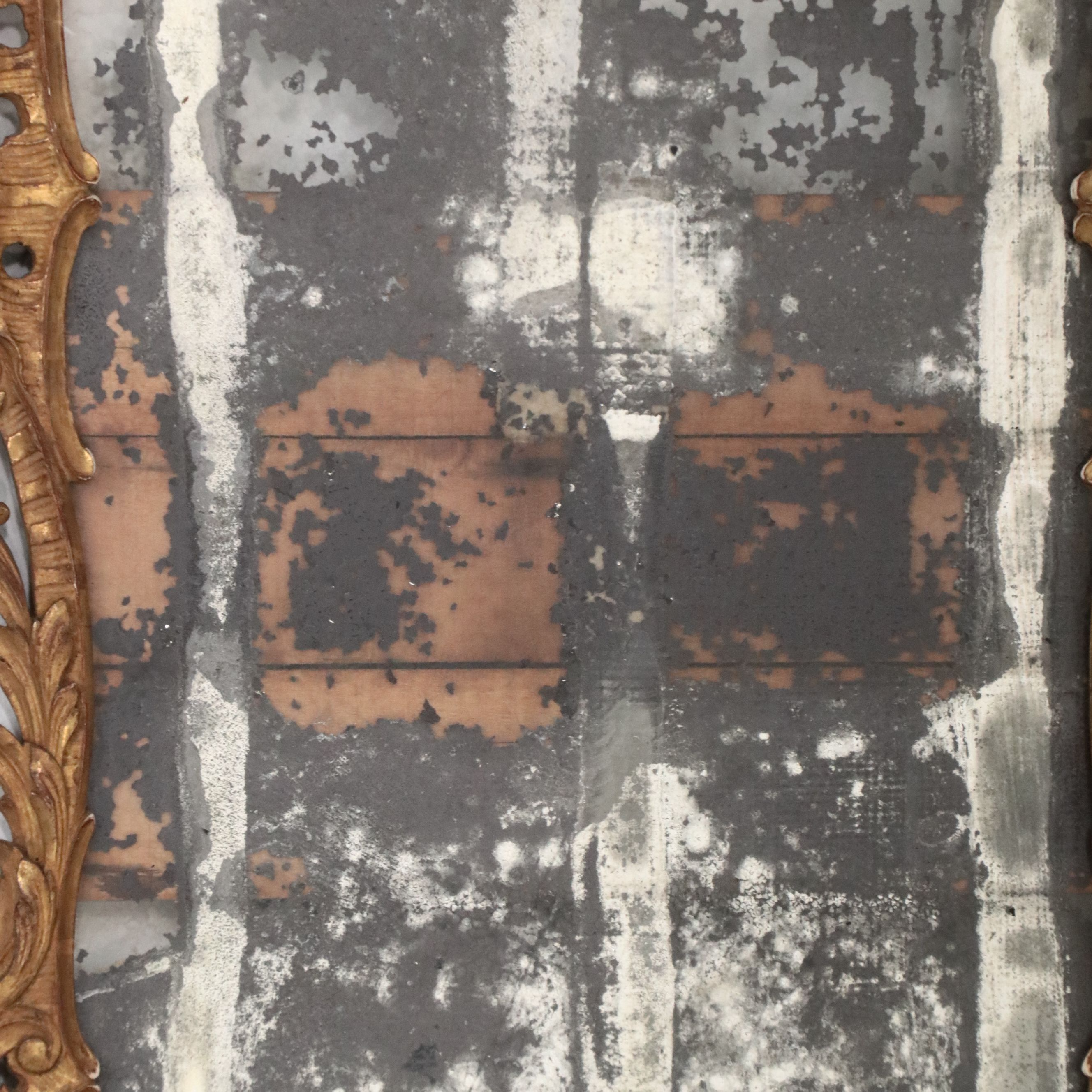 Pair of Louis XV Carved Giltwood Trumeau Mirrors