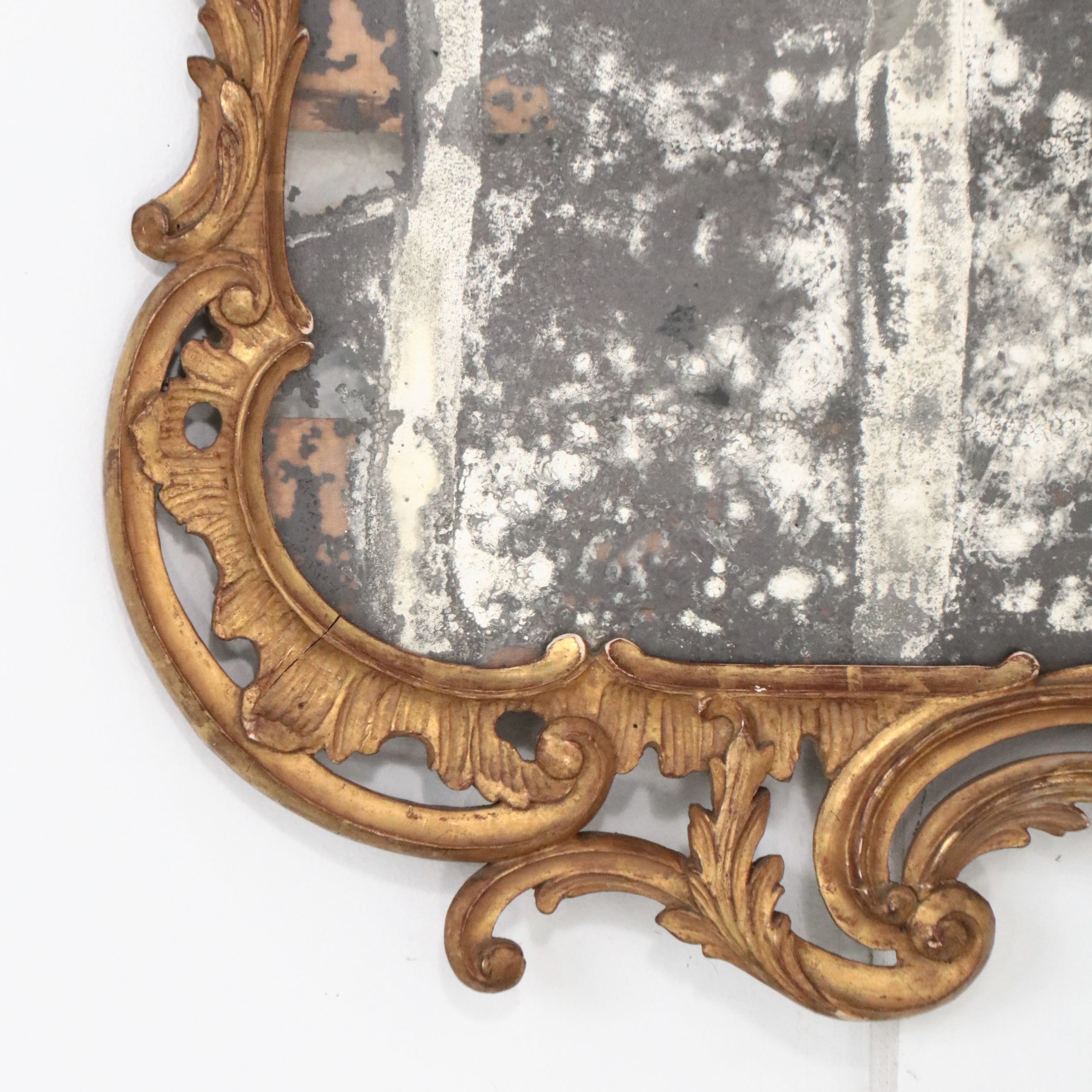 Pair of Louis XV Carved Giltwood Trumeau Mirrors