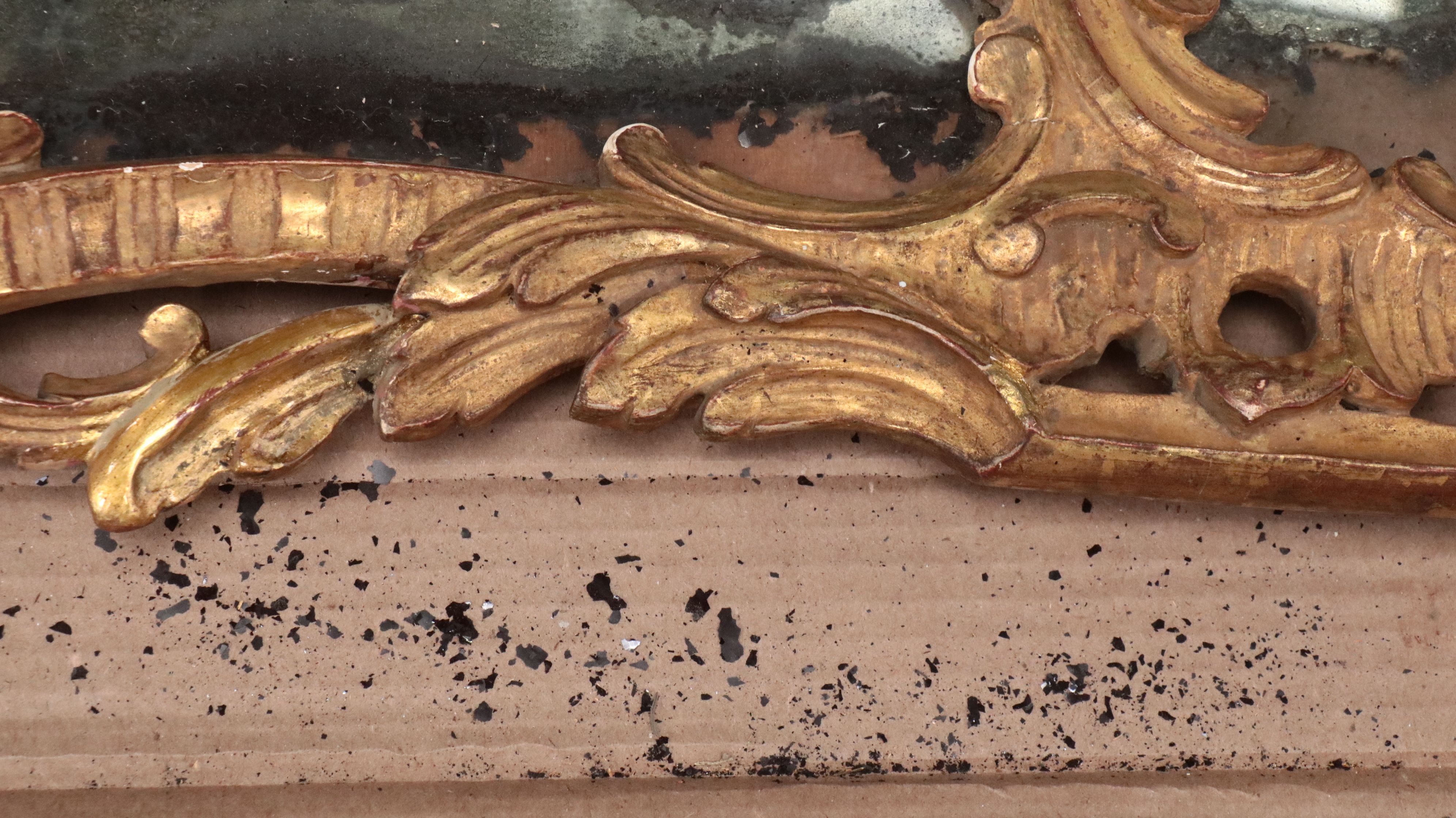 Pair of Louis XV Carved Giltwood Trumeau Mirrors