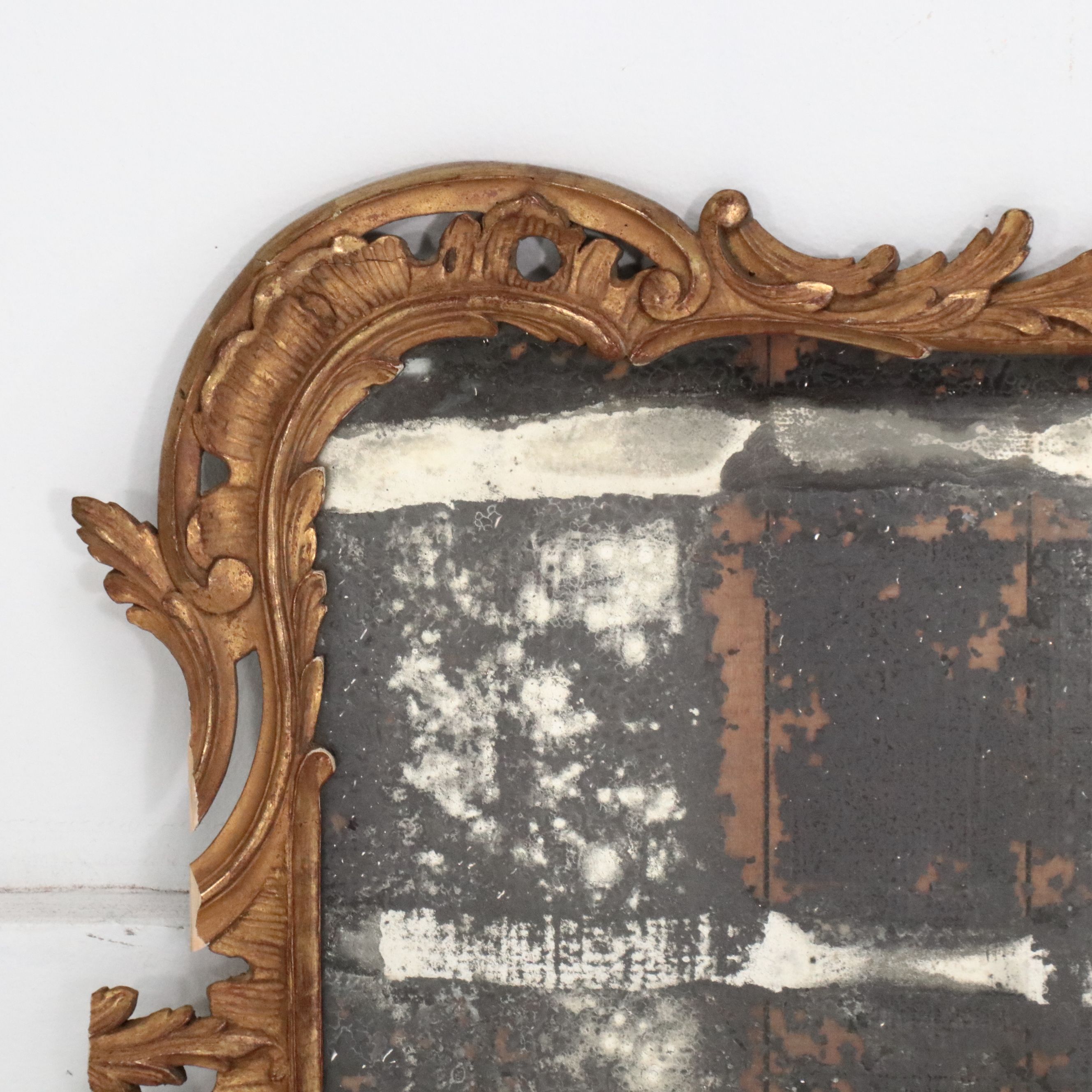 Pair of Louis XV Carved Giltwood Trumeau Mirrors