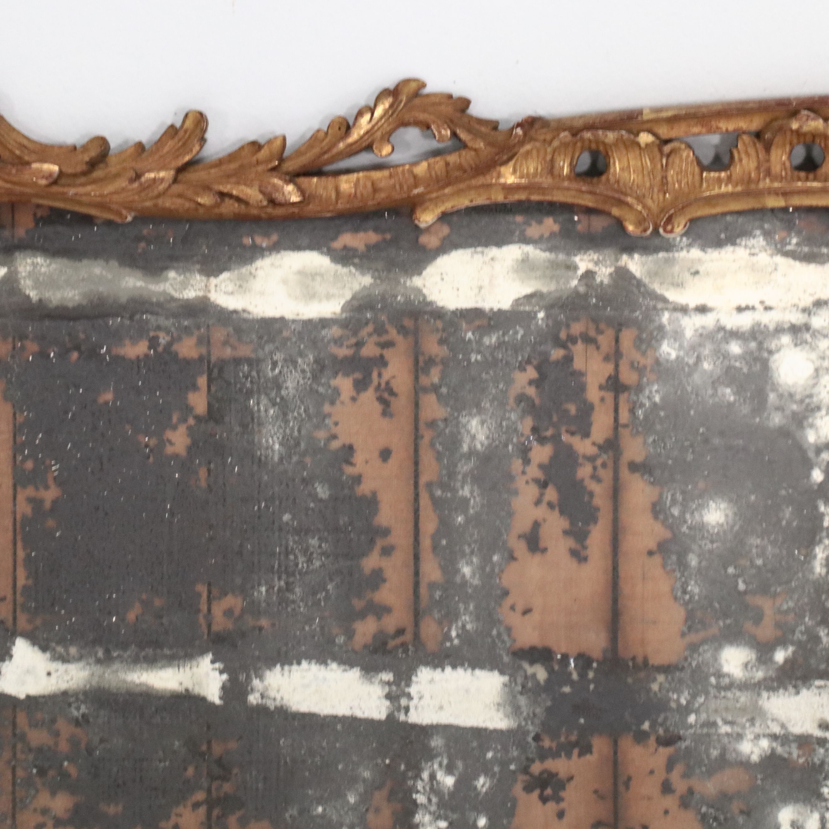 Pair of Louis XV Carved Giltwood Trumeau Mirrors