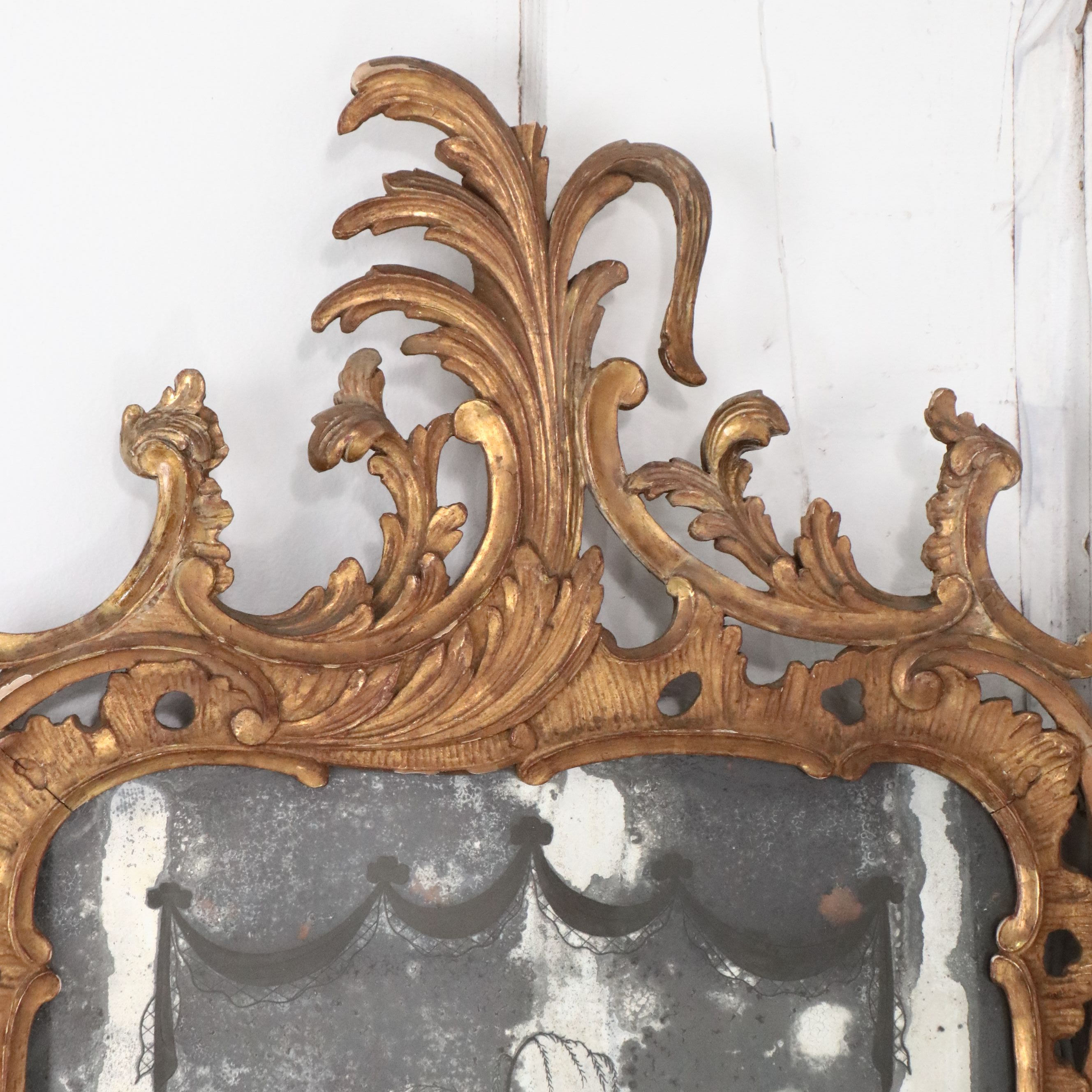 Pair of Louis XV Carved Giltwood Trumeau Mirrors