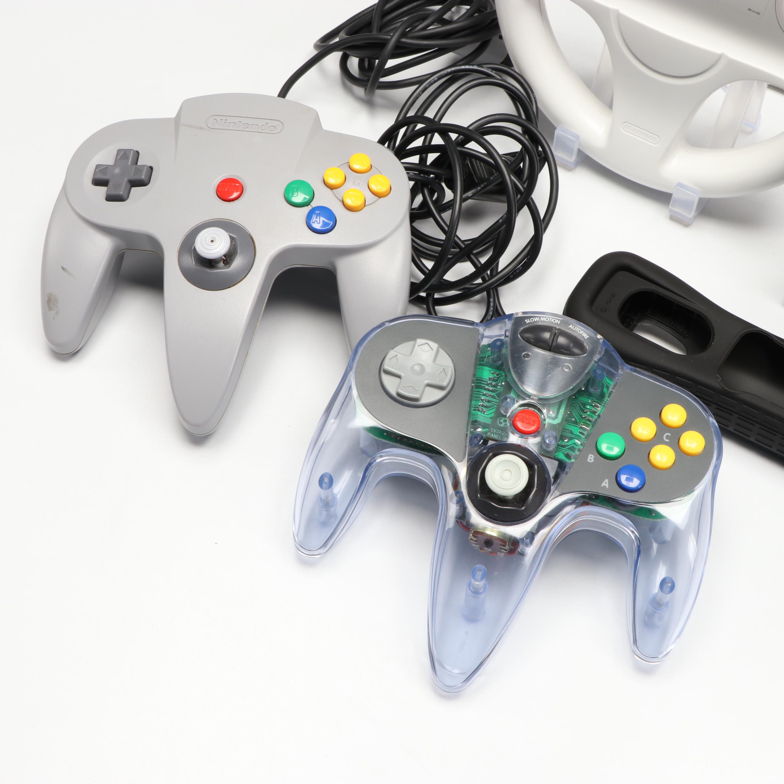 Nintendo 64 Controllers with Wii Remote, Jacket and Wheel Accessory