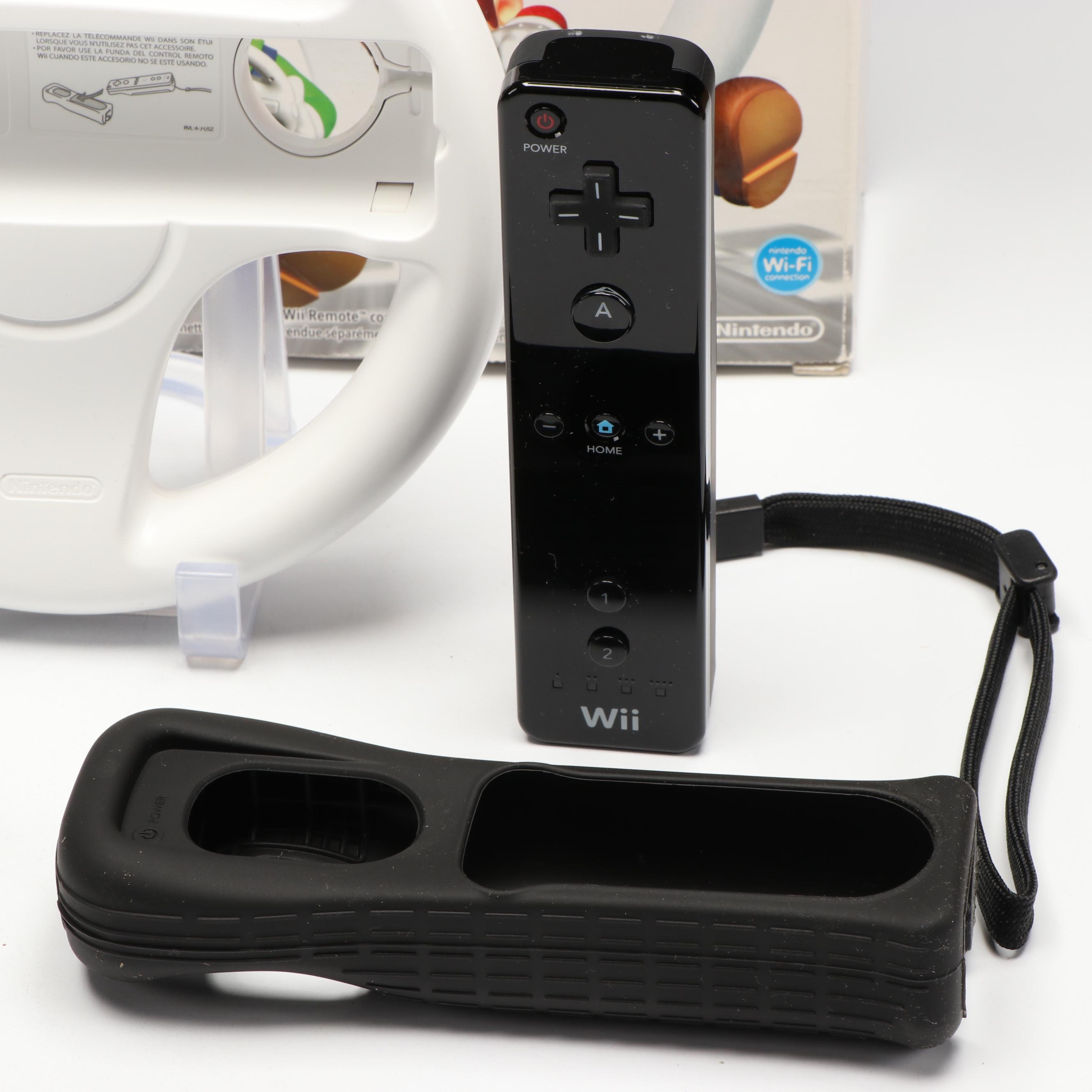 Nintendo 64 Controllers with Wii Remote, Jacket and Wheel Accessory