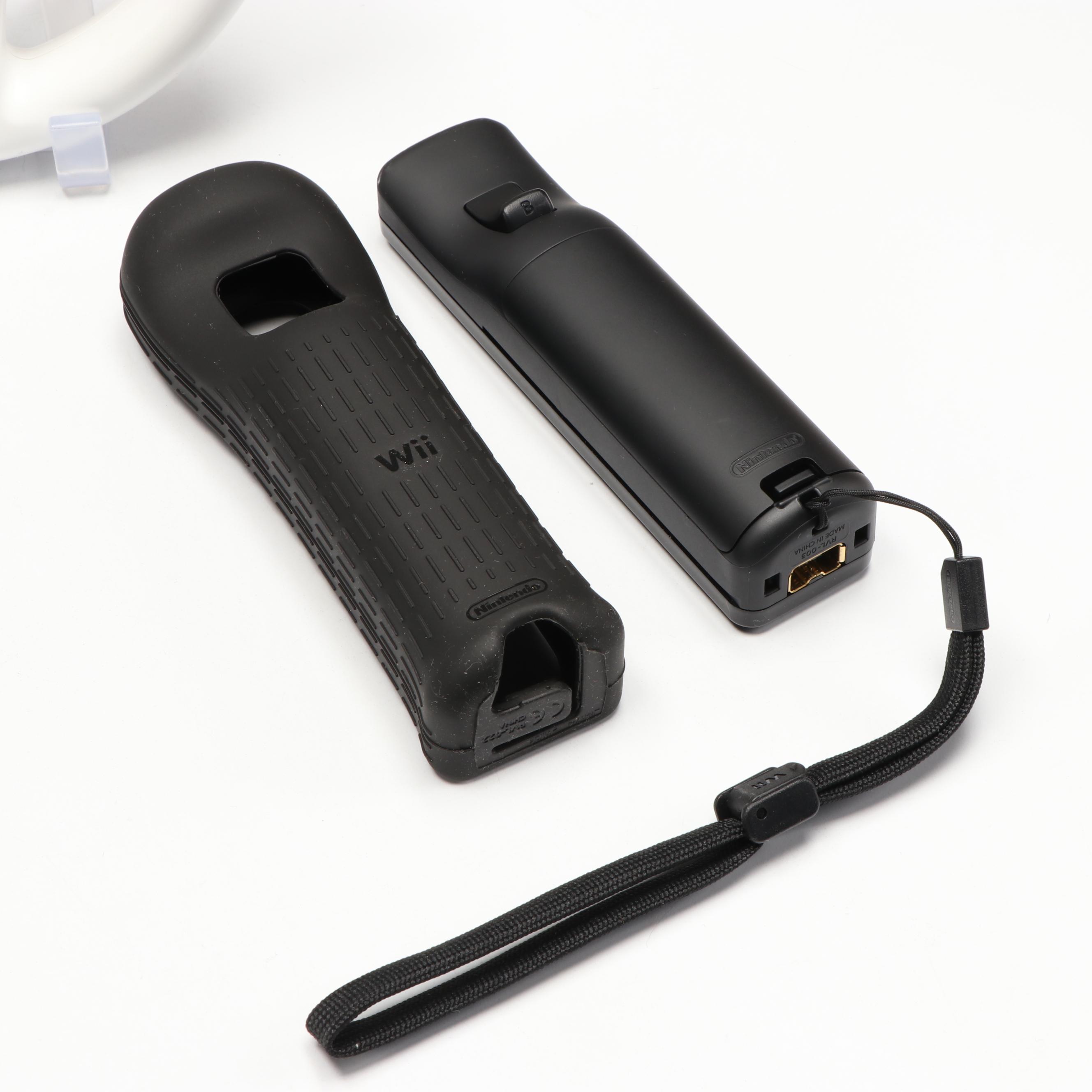 Nintendo 64 Controllers with Wii Remote, Jacket and Wheel Accessory