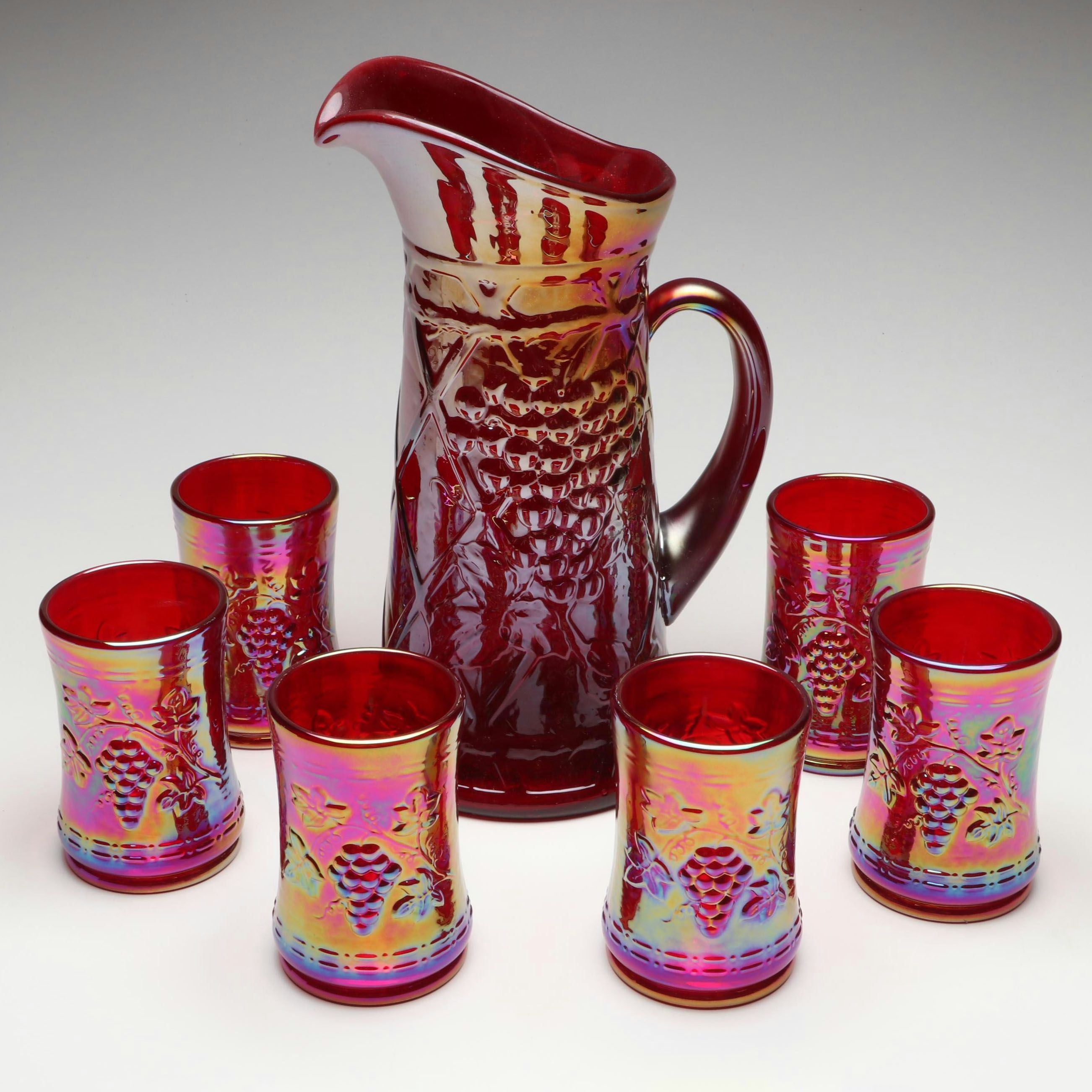 Gibson Cranberry Carnival Glass Pitcher and Tumblers
